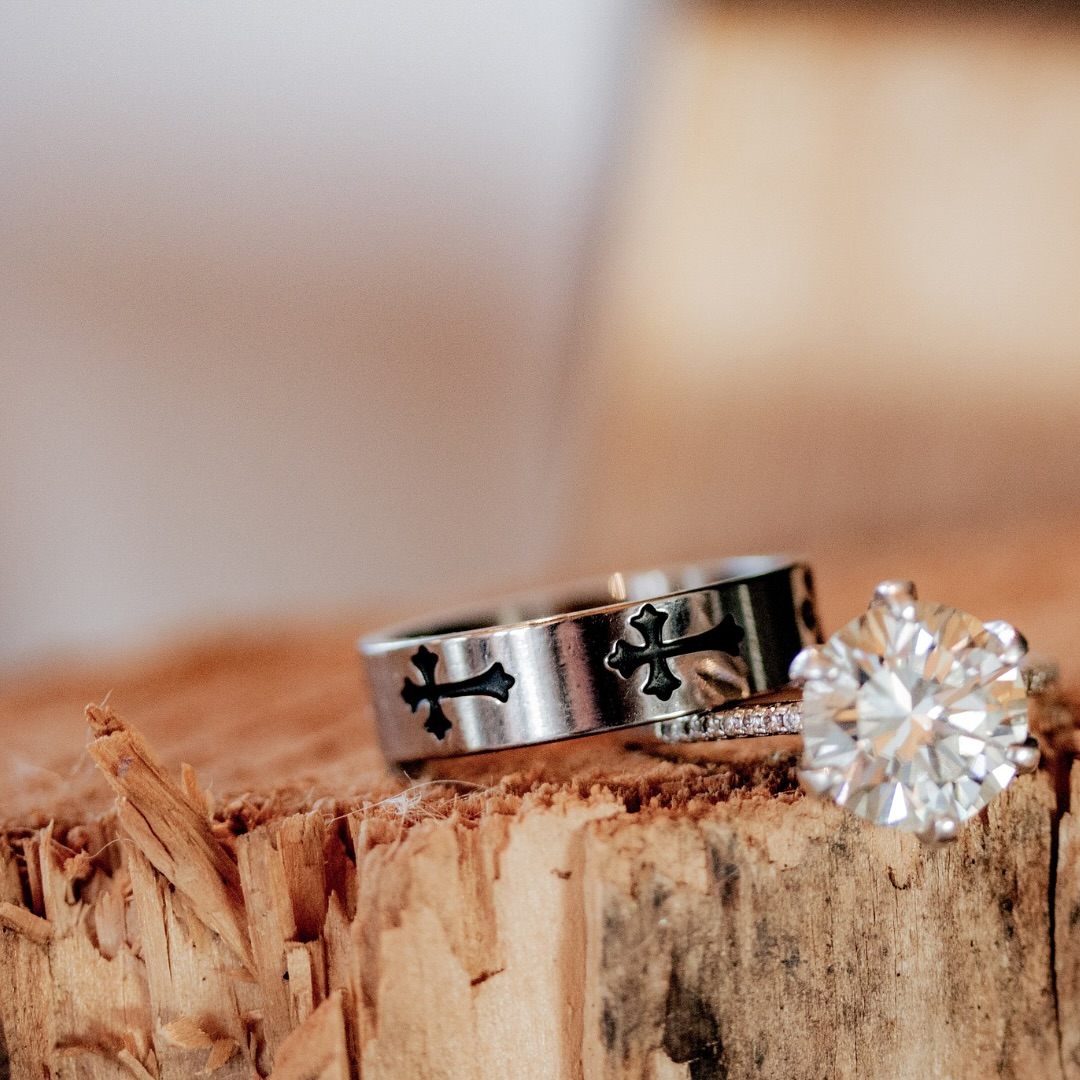 A symbol of forever—these wedding rings are more than just jewelry. ✨ Her ring, adorned with a breathtaking diamond, shines as brilliantly as their love. His, etched with crosses, represents faith and devotion. Together, they tell a story of commitment, unity, and a future built on love.
Swipe through to see the beautiful details up close—every angle, a reminder of the promises made on their special day. 💍🤍 #ForeverStartsHere #SymbolOfLove #WeddingDetails #ringshots #weddingrings #yegweddingphotographer