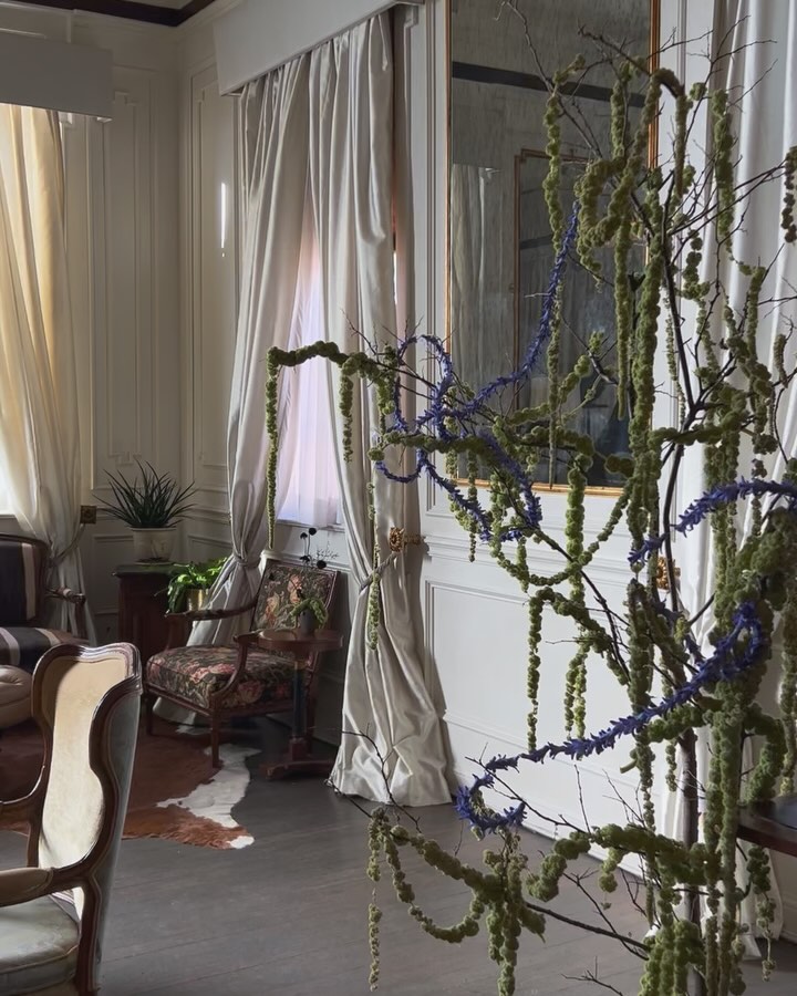 Two fun bar moments for J & J
- Cocktail hour bar was a foraged branch with dripping amaranthus and playful stands of hyacinth.
- Reception bar was a tangle of smilax with vanda orchids, black scabiosa, and taxidermy butterflies to tie in with the head table.