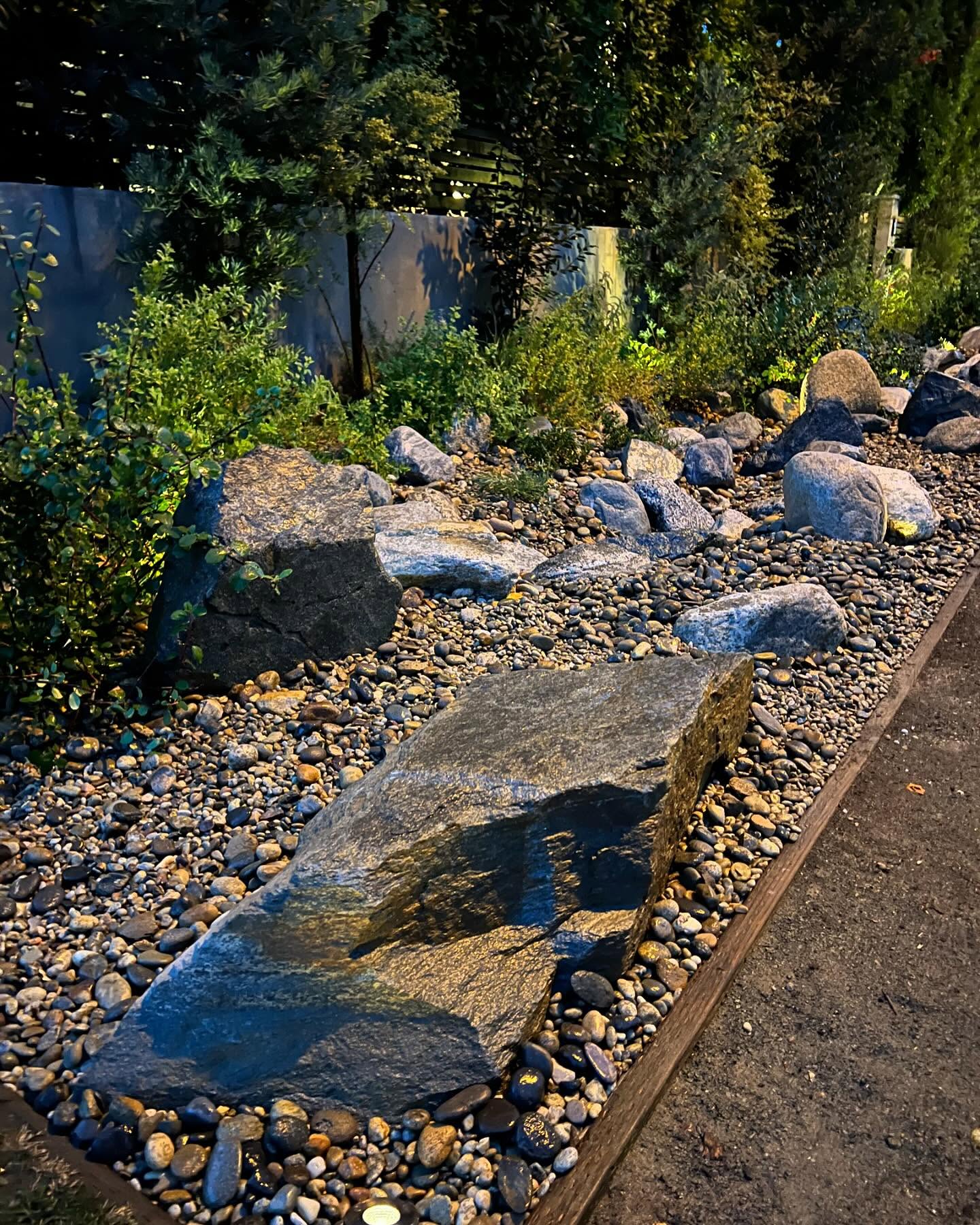 Amazing what a difference a boulder makes. #flat #heavy #landscape #boulder #valleyvillage #projectlaurelgrove #design #decomposedgranite #pressuretreatedwood #delrio #yosemiteriverrock #nativeplants #droughttolerant #river #landscapelighting #welllights #virgodesignsandlandscaping