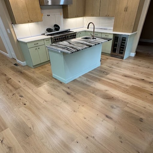 My favorite engineered hardwood. We put down these amazing Super Wide Plank Engineered Hardwood. Installed per our client's instructions, these unfinished live sawn character-grade boards were finished with Bona Natural Seal to enhance the wood's natural beauty and sealed with Bona HD Traffic for superior durability.