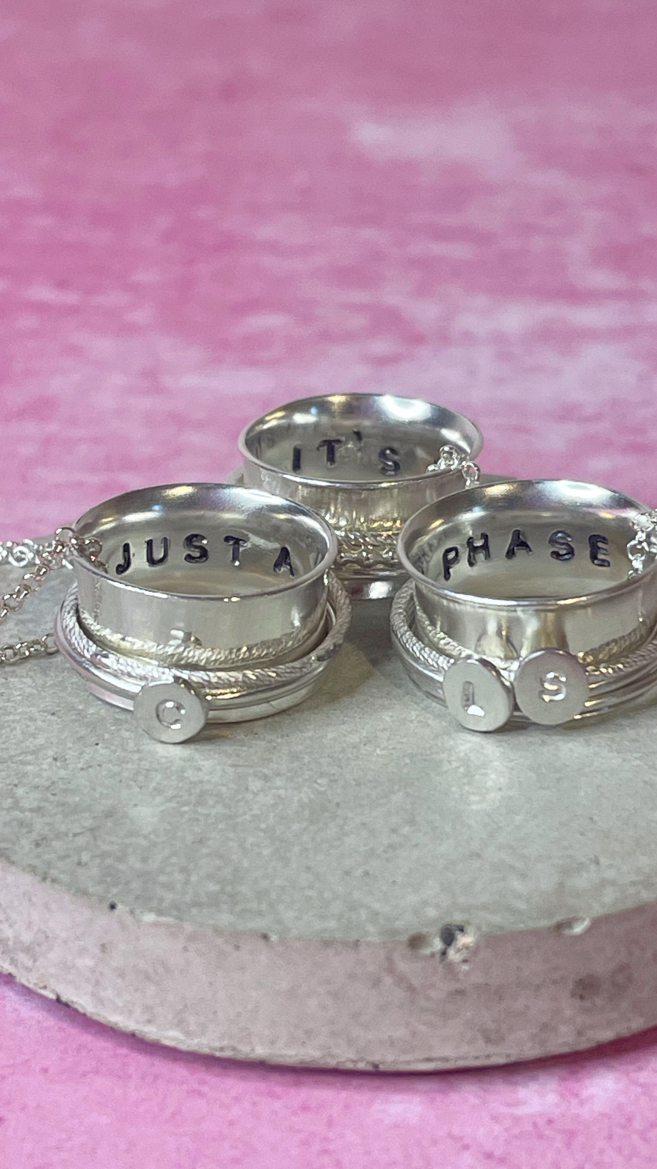 A little something for the mums out there… as half term is fast approaching 😳 My new ‘It’s Just A Phase’ spinners 🫣
.
.
.
.
.
#jewellery #jewelry #handmade #handmadejewellery #weddingring #silver #silversmith #ring #fashion #gift #smallbusiness #fairtrade #ethical #fishertonmill #recycled #necklace #celinacjewellery #spinnerring #halfterm #anniversarygift #mumlife
#salisbury #gifts #giftsforwomen #personalisedgifts #salisburyindies #mums #mum #hollyandco #homeofsmallbusiness