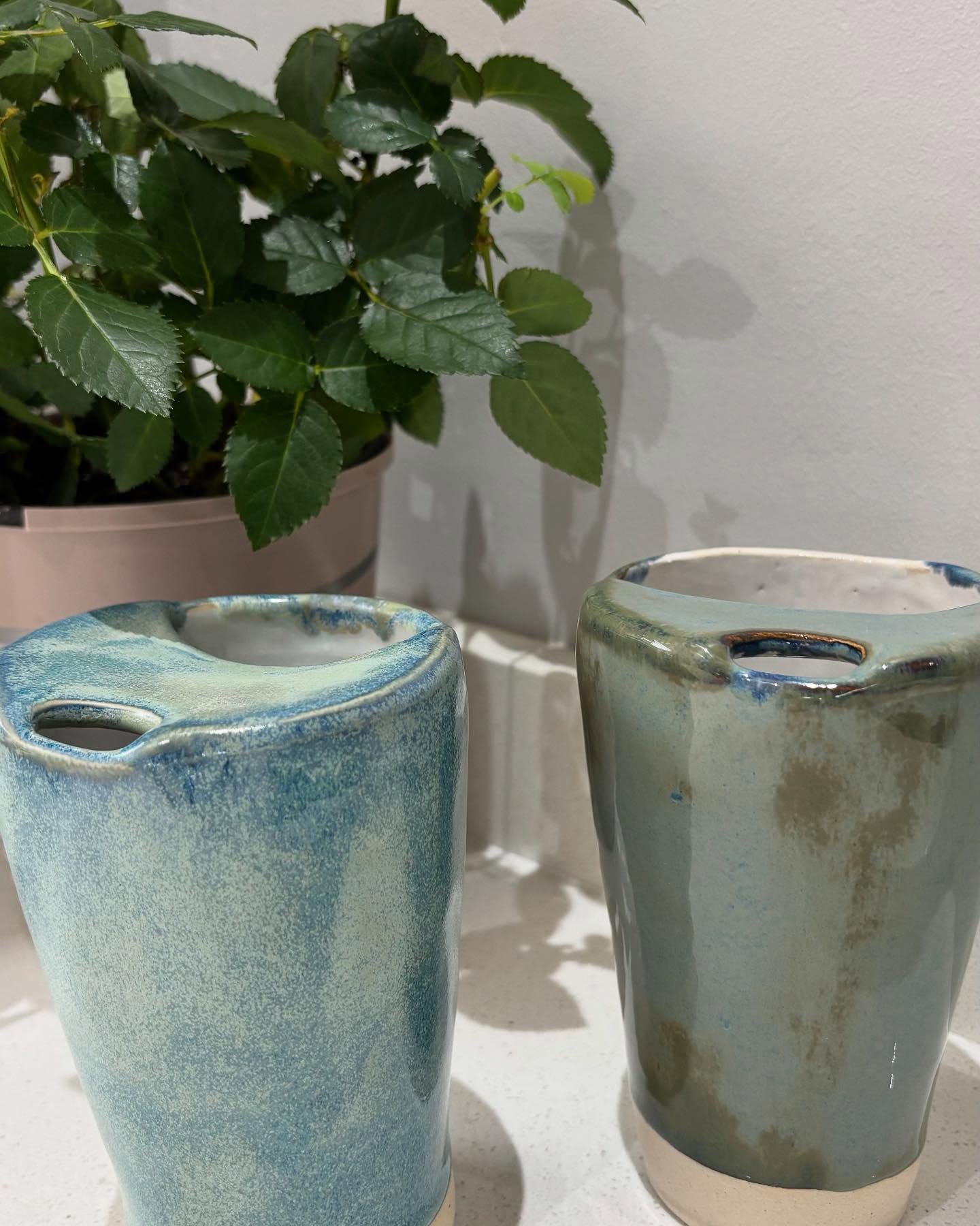 Travelling mugs that were presents over the holidays. Hand build by me and glazed by my two daughters.