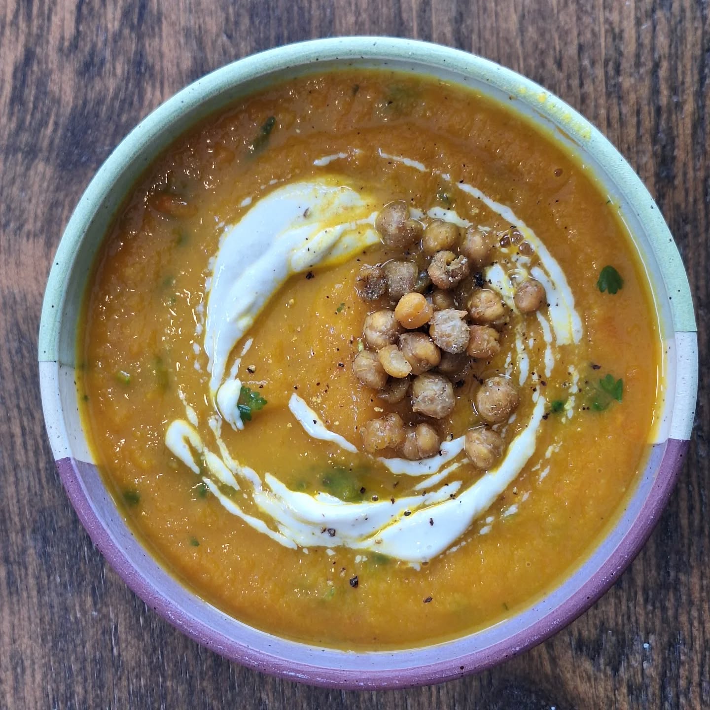 OK, so I may be a little obsessed, but I love soup! It's easy, delicious, versatile, and healthy. This recipe is from @smittenkitchen. It's carrot topped with roasted chickpeas and a lemon-tahini swirl. I love tahini (made from ground sesame seeds); it's a great source of plant protein, fiber, healthy fats and calcium and copper, both of which support bone health--something we need to be conscious of as we age and are at greater risk of developing osteoporosis. Other great plant sources of calcium include dark leafy greens, almonds, broccoli, tempeh, and tofu.