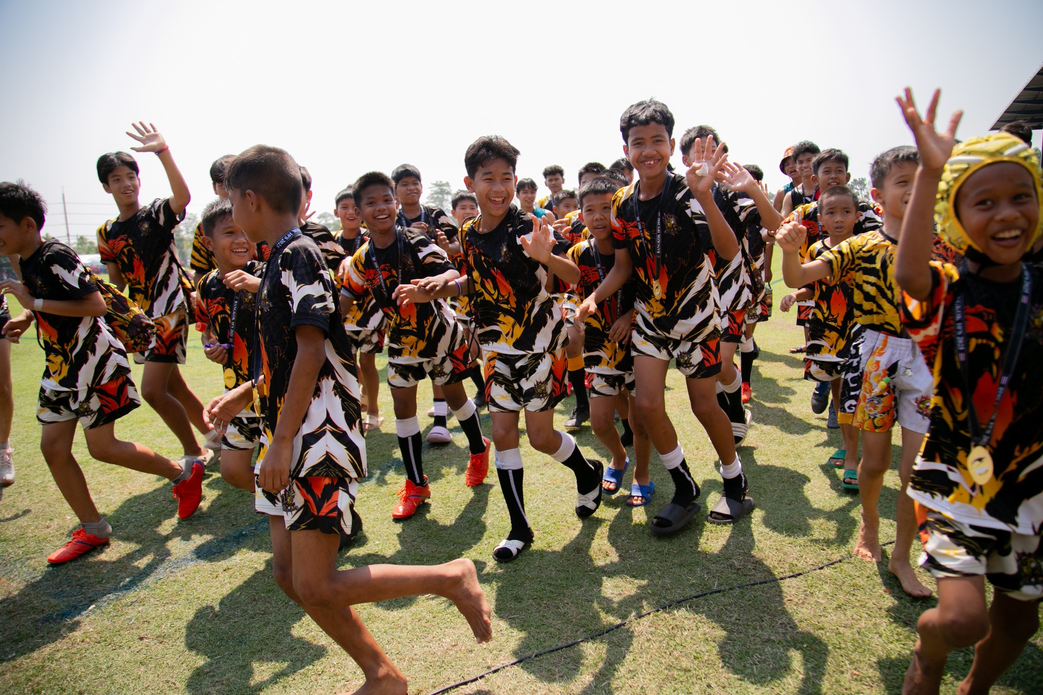 @bangkok10s 2025 – 🏉
We are incredibly grateful to everyone who played a role in making this year’s Bangkok 10s such an amazing experience for our Nak Suu kids!
This year, we were proud to enter a U10 and U12 team with our younger boys, alongside U14, U16, and Girls teams with the fantastic support of the kids from Nawamin and the @bangkoklionsrugbyfc. It was an unforgettable weekend as our kids had the opportunity to compete against both local and international teams, creating memories that will last a lifetime.
A massive thank you to our dedicated coaches, translators, and volunteers who gave their time and energy throughout the tournament. From coaching and organizing kits to ensuring the kids were well-fed and even tracking them down from the air-conditioned bathrooms and the kids’ zone—your efforts made it all possible!
Lastly, to everyone who participated, from the youth teams to the adult teams, your involvement and encouragement mean the world to us. The Bangkok International Rugby Tens Tournament and the Nak Suu program itself thrive because of your generosity and commitment.
Enjoy the many photos of our kids in action, and we look forward to seeing you all again next year!
#naksuurugbyacademy #naksuurugby #naksuu #bangkok10s #thankyou #growingthegame #thailand #bangkok #underprivledgedchildren #charity
