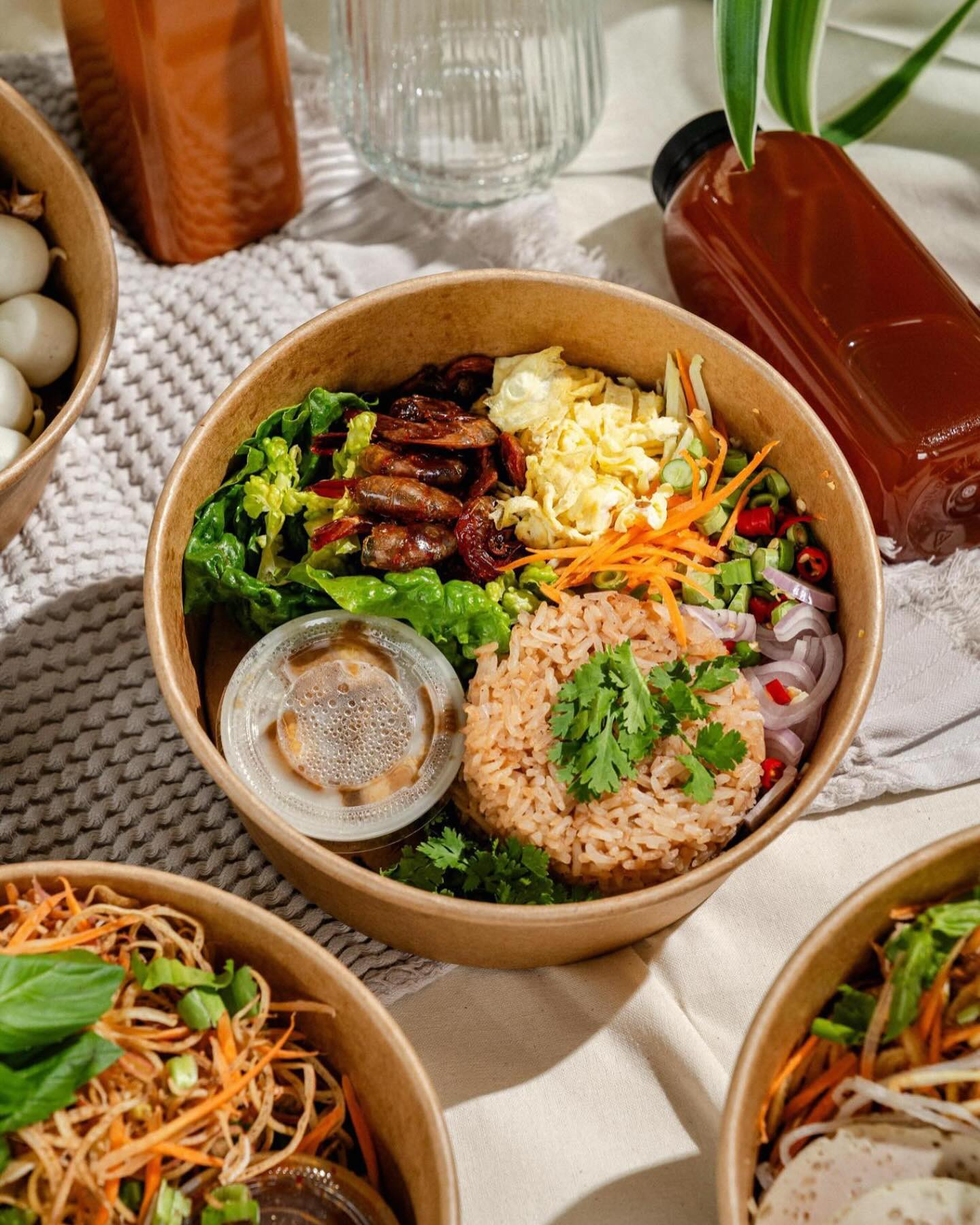 Shrimp paste Fried Rice
Caramel Shrimp, Sour Mango, Long Beans, Shredded Omlette, Sweet & Salty Pork Belly, Wing beans, Shallots, Red Chili, Shallots.
A unique dish bursting with flavor it. Give this a try !