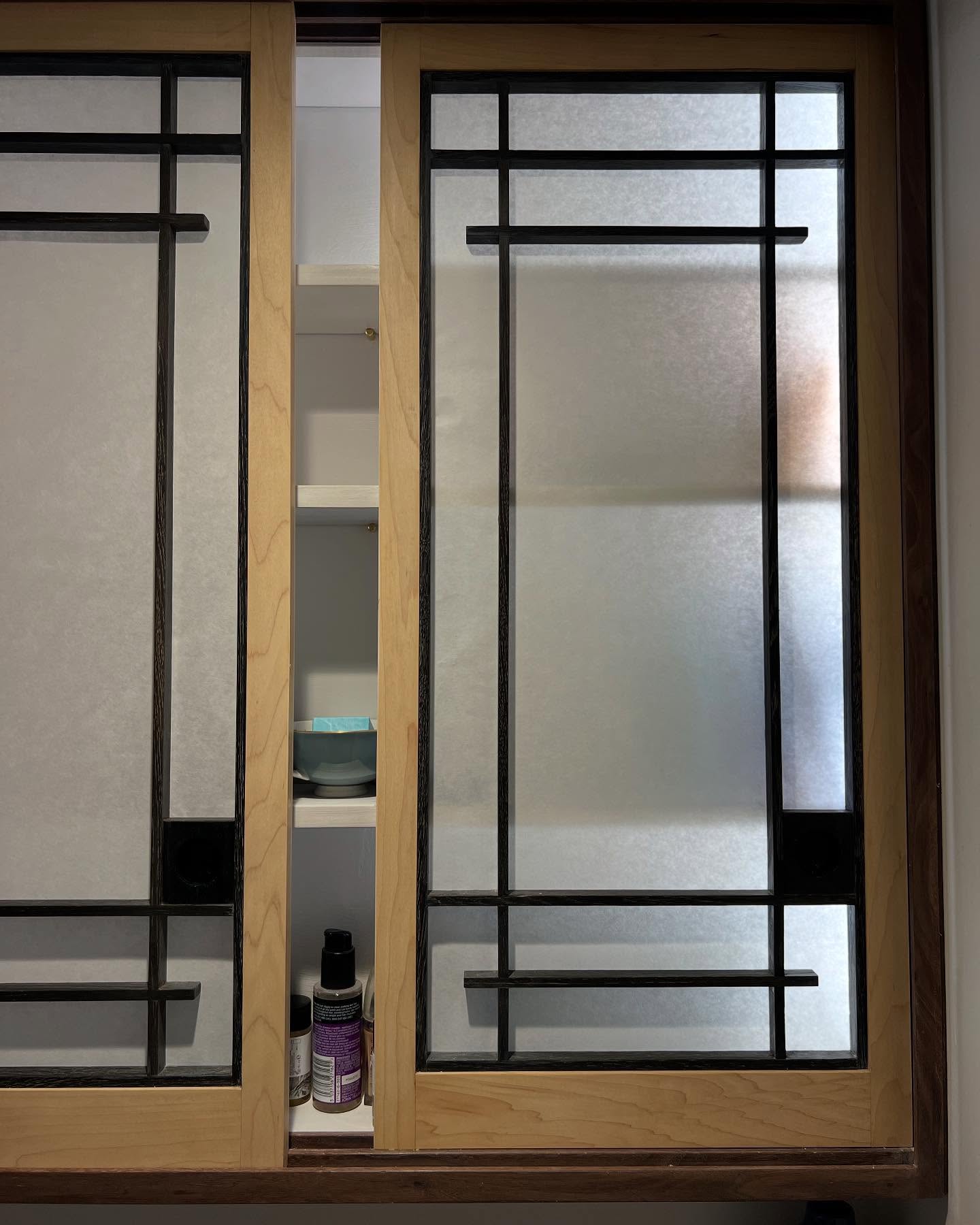 I have been obsessing about Japanese woodworking (including their tools) for many years. This beautiful cabinet has a mulberry shoji paper backing which allows the light to filter through and reveal the crossed design.
‘Shoji’ comes in many forms and is a catch-all term for the screens and sliding doors . This sliding door cabinet, made with contrasting Maple and Bog-Oak with a Walnut frame is inspired and informed by Toshio Ōdate, perhaps not completely traditional
in construction (for the purists) but running on wooden glides and using traditional Shoji paper from
- Shepherds London
Many thanks to a wonderful client whose patience allowed for the design process to run its course.
#handmade #bespoke #cabinetmaker #shoji #traditional #woodwork #japanese
#bespokejoinery #woodworkingessex @woodalldesigns woodalldesigns.com