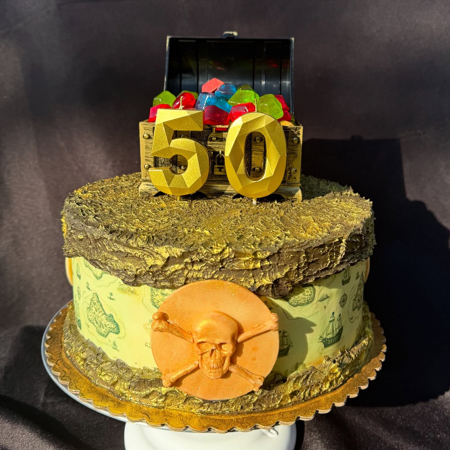 โYo hoโ to ARRR favorite matey on his 50th Birthday!
๐ดโโ ๏ธ
Vanilla Cake with a Black Chocolate Gold Buttercream Fault Line topped with White Chocolate Gold Coins and handmade Candy Gems. With Gold Sugar Cookies.
#pirate #pirateparty #50thbirthday #50th #50thcake #cakespaz #customcake #vanillacake #chocolate #blackchocolate #goldcake #goldbirthday #goldencake #ediblegold #faultline #faultlinecake #specialtycake #piratebirthday #piratecake #piratesofthecaribbean #treasure #treasuremap #treasurecake #treasuremapcake #sacramentobakery #elkgroveca #elkgrovebakery #elkgrovecustomcakes #sacramentocustomcakes #ordercustomcake