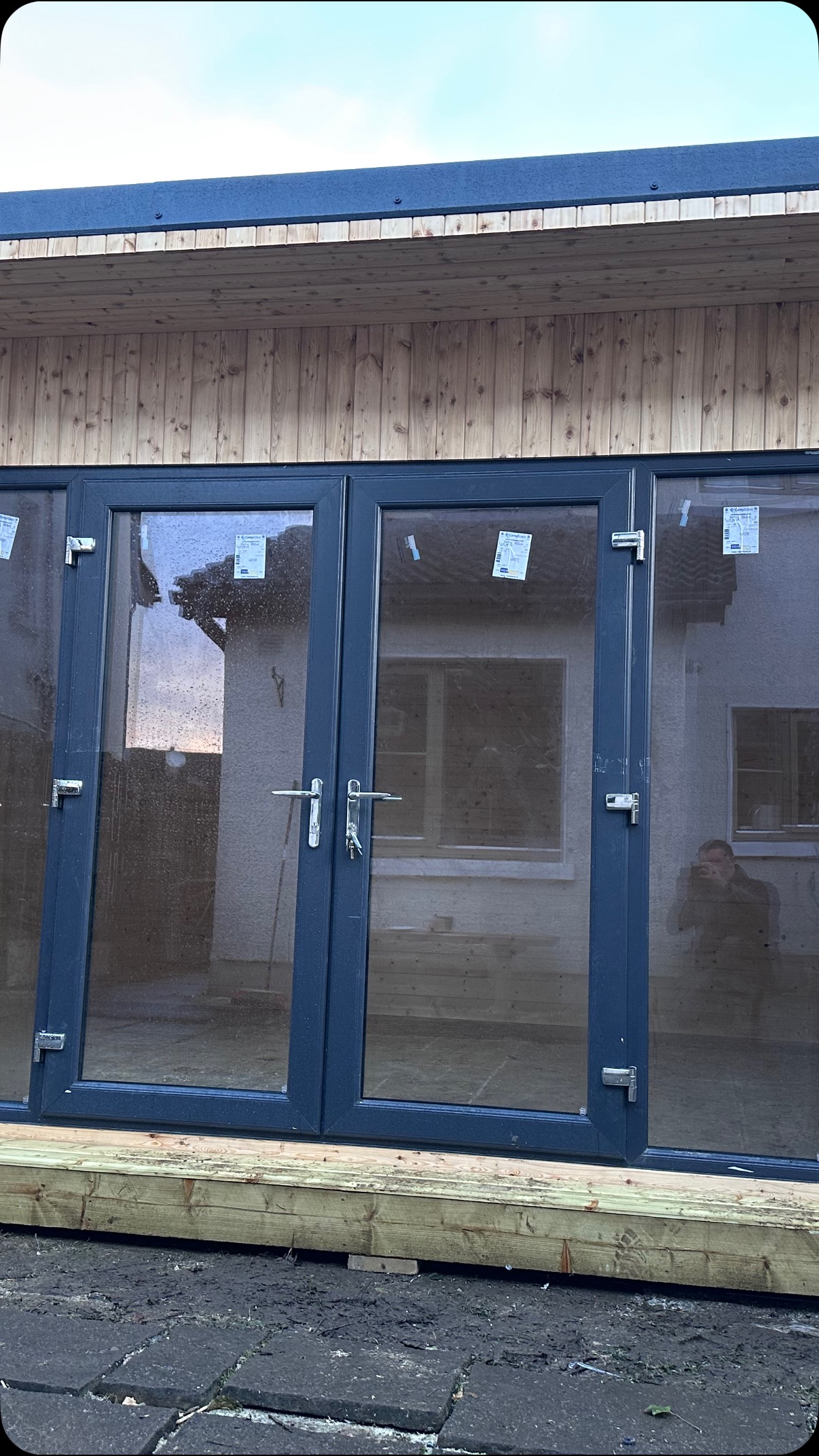 Beautiful larch timber finish on this 16x11 foot cabin, with 3 meter panoramic French door #morantimbercabins
