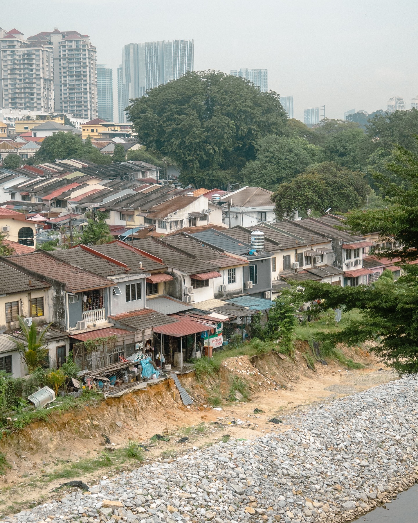 How will Melbourne’s goal to fill in the ‘missing middle’ and become the townhouse capital look like? Returning from my trip to Malaysia, it was interesting to see another city’s architectural and urban response to this question of medium density.
Roof forms, facade treatments, and contrasting elements, shape Kuala Lumpur’s semi-detatched architectural vernacular of everyday buildings, both dwellings and commercial. Through its quantity, it has formed a particular identity within the urban landscape.
.
.
#architecture #urbanism #malaysia #kualalumpur #building #buildings #houses #architecturalphotography #photography #architecture_hunter #urban #archdaily #architecturegram #city #cityphotography #architecturewriting #exploration