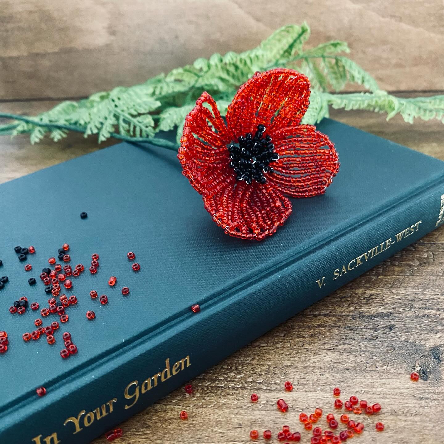 Once you have one of the patterns from our kits, you can make more flowers using different beads! This is our poppy flower made with silver lined transparent red glass beads instead of the opaque ones you get in the kit - adds a little sparkle!
#thebeadedgarden #poppy #poppyflowers #craftkit #beadedflower #reuse #mindfulcrafting #crafting #craft #craftastherapy #craftaddict #follow