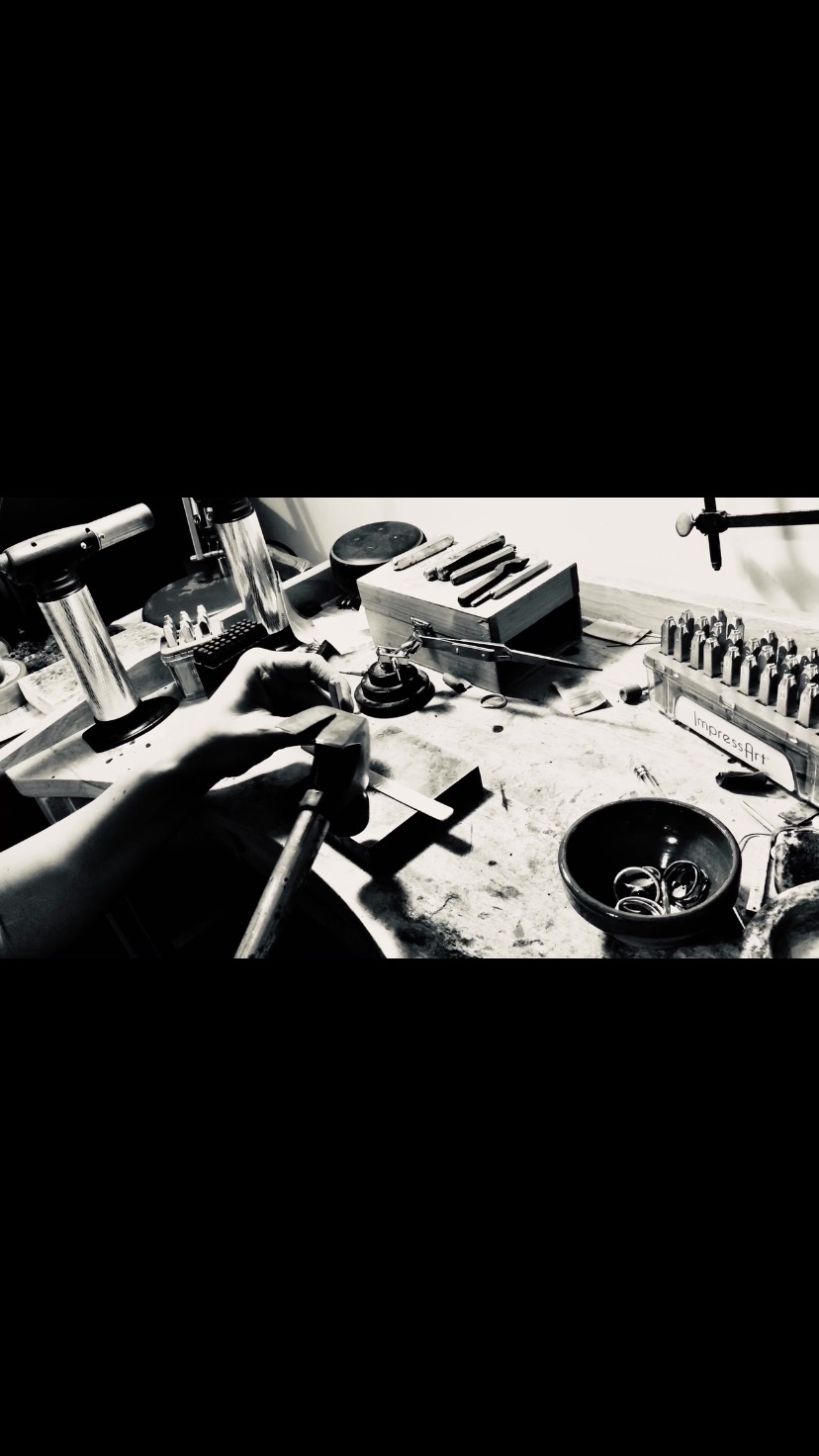 We don’t engrave, we stamp each letter individually using a heavy old hammer and metal punches…its way cooler 😁
Handmade, personalised Silver jewellery, by @magicinthegrass