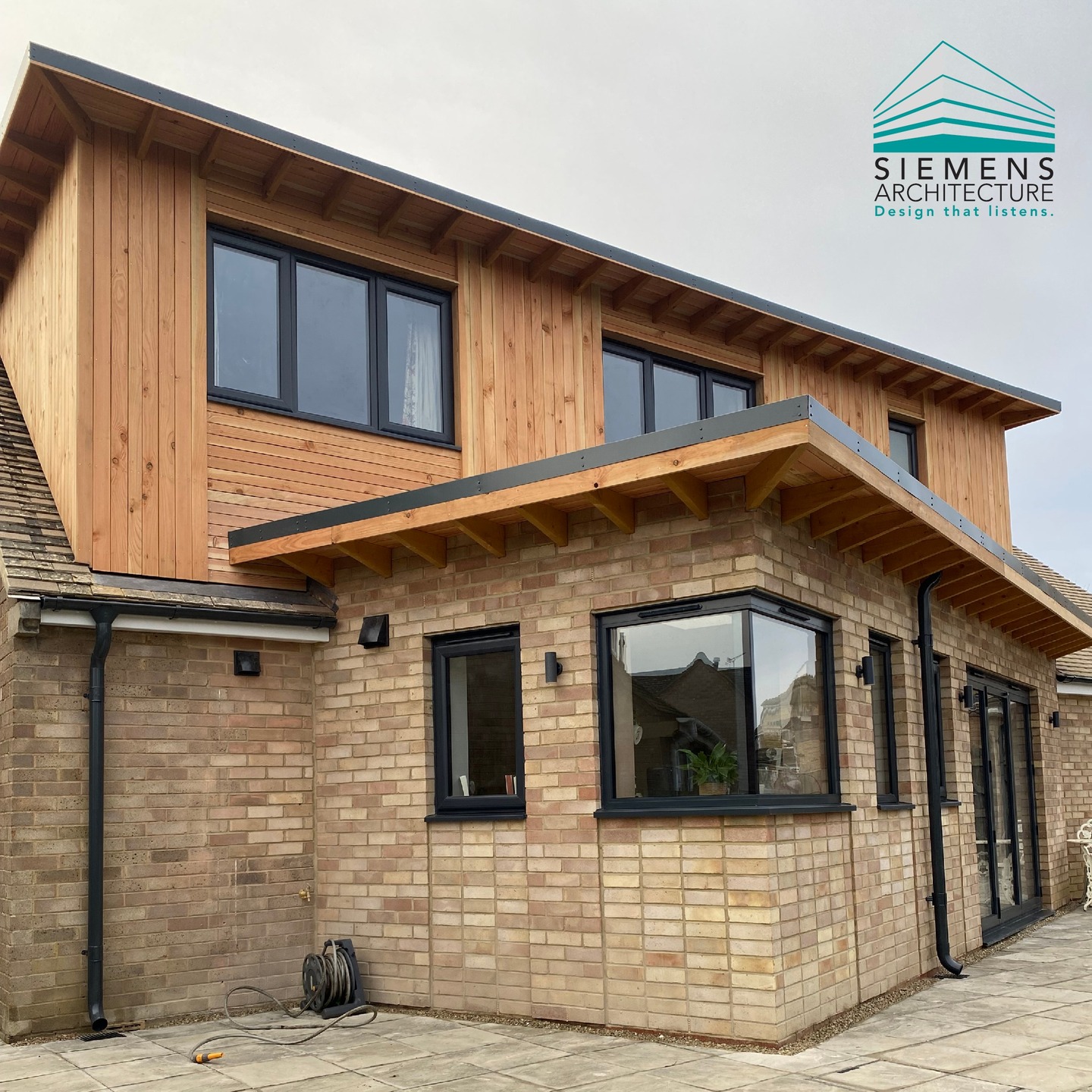 This rear + side extension and loft conversion of a 60's bungalow on a shoestring budget was completed just before Christmas.
The angled rear extension was generated by a reduction in floor area to accommodate the client's budget and importantly to maximise solar penetration into the space despite a sub-optimal orientation.
#exposedrafters
#brickbond
#timbercladding