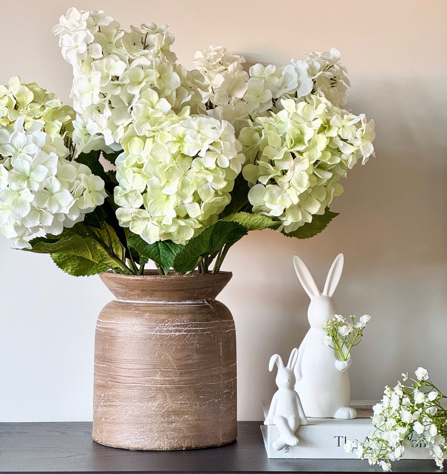 Spring Serenity 🌿🐇
Refresh your home with our Matte White Ceramic Bunnies and Faux Light Green Hydrangea Paniculata, timeless pieces that bring an effortless spring touch to any space. ✨
These delicate ceramic bunnies add a charming, minimalistic elegance, while the lifelike hydrangeas bring soft, natural tones that are perfect for the season. 🌸🌿
Tap the product links to shop now! 🛍️
#SpringDecor #InteriorStyling #HomeInspiration #BoxwoodHomeInteriors #SpringInteriors #FauxFlowers #HomeDecorLover #CeramicBunnies #FloralDesign #NeutralInteriors #MinimalistHome #InteriorTrends #LuxuryHomeDecor #FauxFlowersForDays #EasterDecor #ShelfStyling #InteriorDesignIdeas #SpringAesthetic #TimelessInteriors