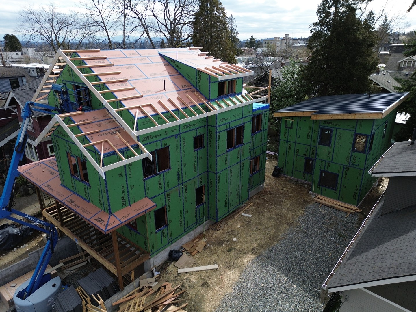A few shots of our "Monopoly" roof in process. Matt has completed all the bolted-on rafter tails and fascia and now the roofers are laying down the 3.5" of rigid foam between the tails and across the roof. On top of that goes 1/2" plywood and then underlayment and roofing.
This roof isn't the simplest example of the assembly but we've worked with Endurant Roof (@endurantroof) on I think 4 of these now and they know the process. Brandon and the crew are great to work with and I recommend them for anyone who wants to try this assembly!
Note - we're using GPS foam here which is graphite impregnated EPS foam. Still the "least evil" of the rigid foams, but with graphite sprinkled in resulting in a higher R value (5 per inch vs 4). We get GPS locally through Premier SIPS (@premiersips).
The other benefit of this type of roof is that to the casual observer the 2x4 rafter tails look traditional and period-appropriate for this traditional style home, masking a very modern and high performance roof underneath.
#greenbuilding #buildingscience #sustainablebuilding #buildersofinsta #buildingenvelope #energyefficiency #betterbuilding #lowcarbonbuilding #lowcarbonconstruction #buildingforclimatechange #highperformancebuilding #highperformancehomes