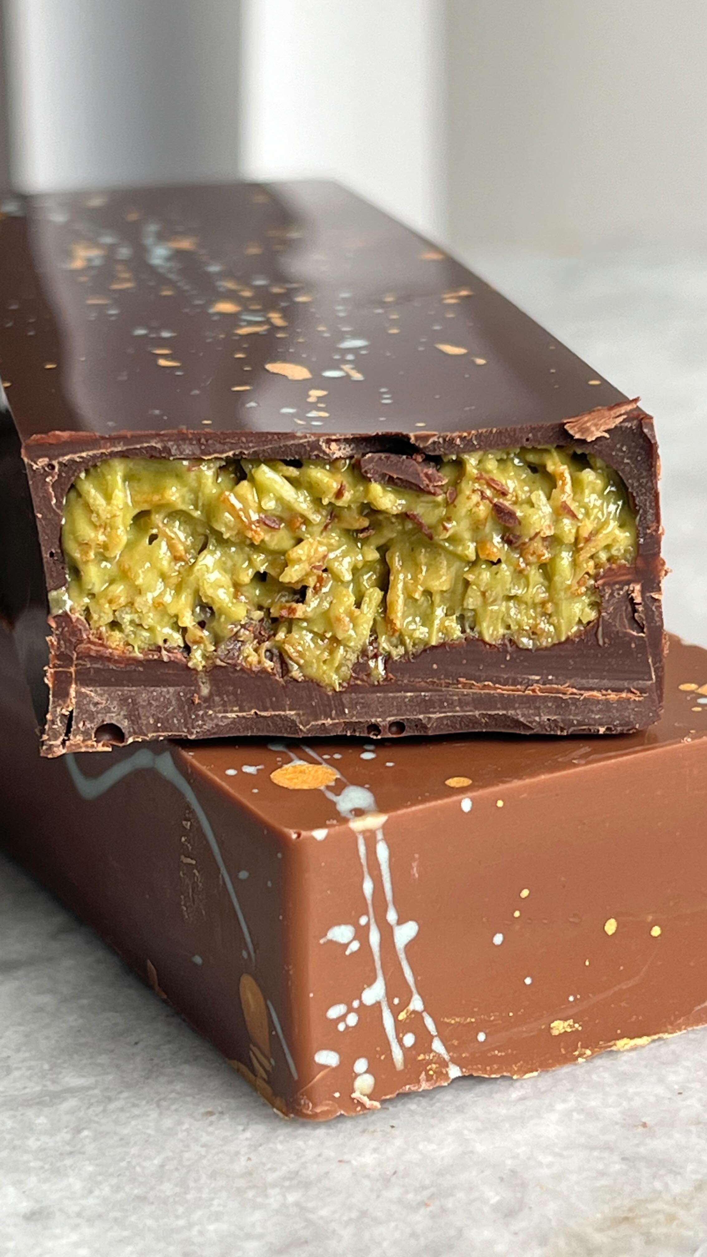 As promised, our Pistachio/Kunafa Dubai style chocolate bar has been added to our collection! It will be available encased in a creamy milk or 70% dark chocolate shell.
Where to find it this week:
📅 Saturday, 15th March
📍 @dukeofyorksquare Fine Food Market
⏰ 10:30 AM – 4:00 PM
See you soon! 🍫✨
#chocolate #kunafachocolate #pistachiochocolate #dubaichocolatebar #finefood #handmade #finechocolate #artisanchocolate #beantobarchocolate #choco #chocolovers #craftchocolate #bonbonschocolat #chelsea #londonfoodies