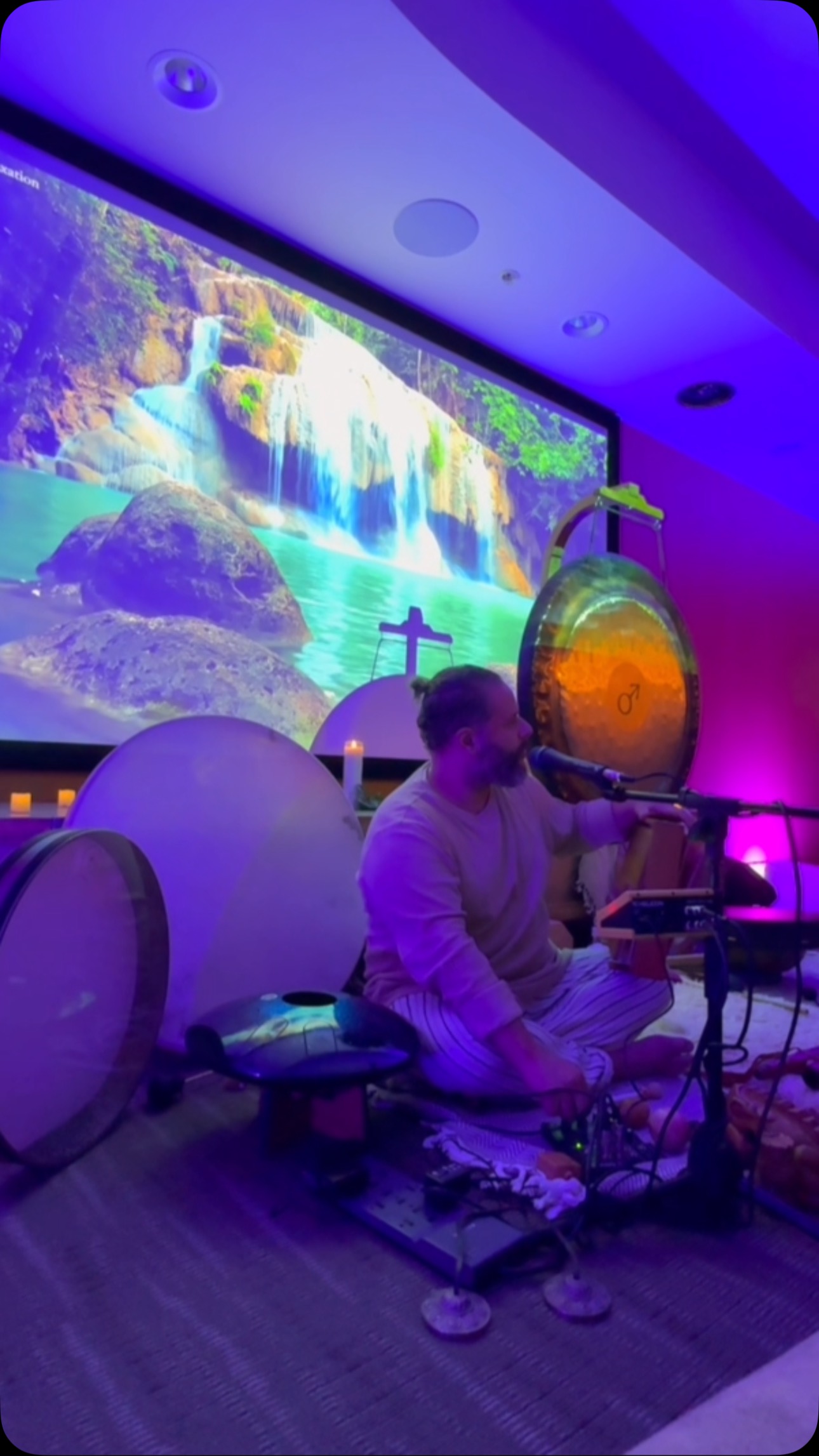 Before the boy sank, before the water held him, there was a hum. Not loud, not sharp—just a tremble, a ripple in the deep. It moved through the pool’s stillness, gold light dancing above, a pattern waiting to be seen. The world didn’t hear it yet—too busy with its own clatter—but it was there, threading through the water, the air, the bones of everything alive.
A strike came later—(((GONG)))—years after the boy became a man, after the drift pulled him far. The sound woke it again, that hum, pulling shapes from chaos: circles in sand, stars in liquid, a truth older than words. It sang through metal, through water, through him—sixty to seventy-five percent a sea, trembling to the same pulse. The spheres knew it too, stars and planets ringing soft, a chorus no one taught him to hear.
He’d find it, lose it, find it again—this hum, this home. It waited in the silence after, in the space between strikes, where patterns held and nothing broke. The boy didn’t know it then, sinking slow, but the sound did. It always would.