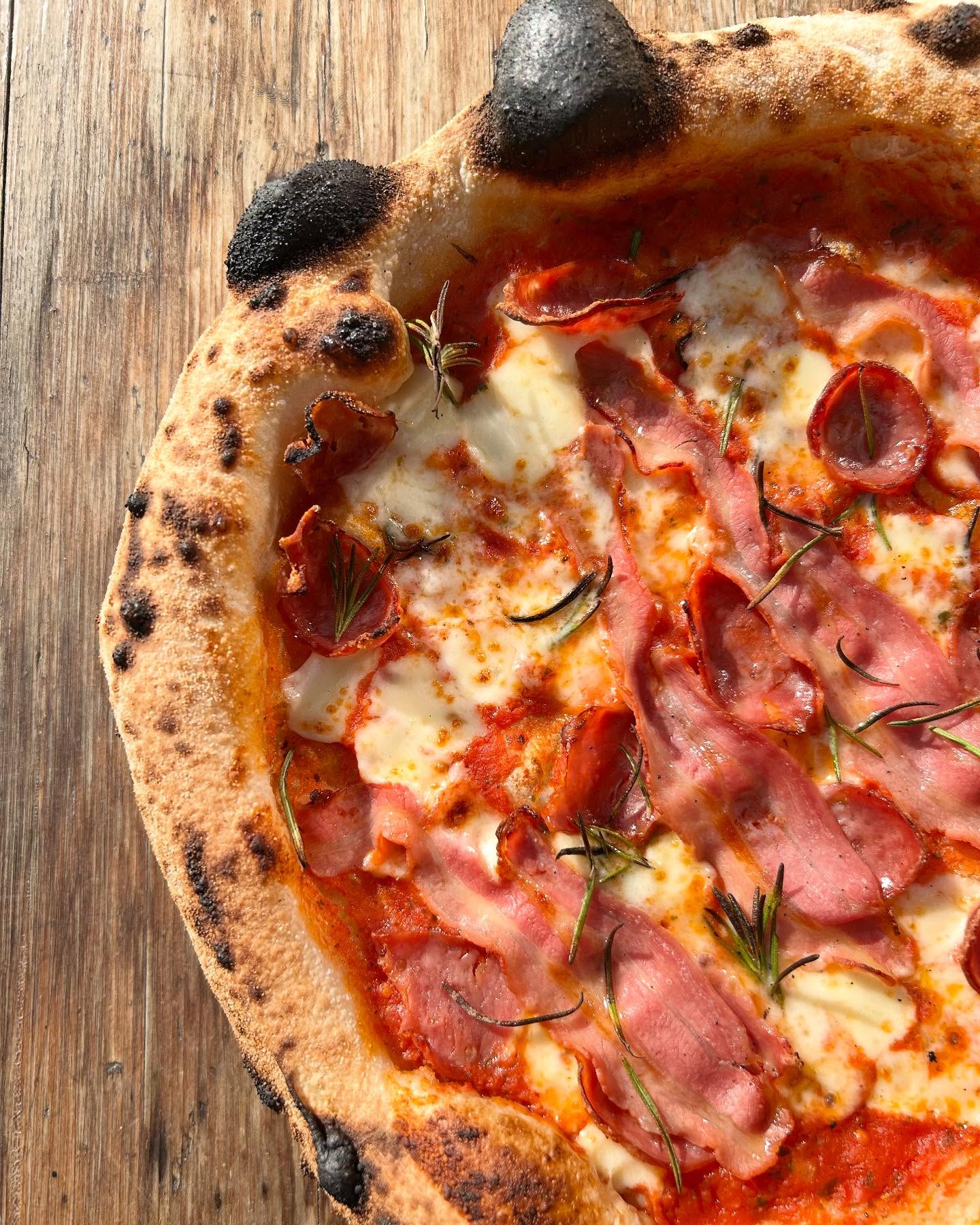 Our Albore pizza is one of our best sellers! Packed with flavour, with tomato sauce, mozzarella, pork and wild boar salami, pancetta, fresh rosemary
