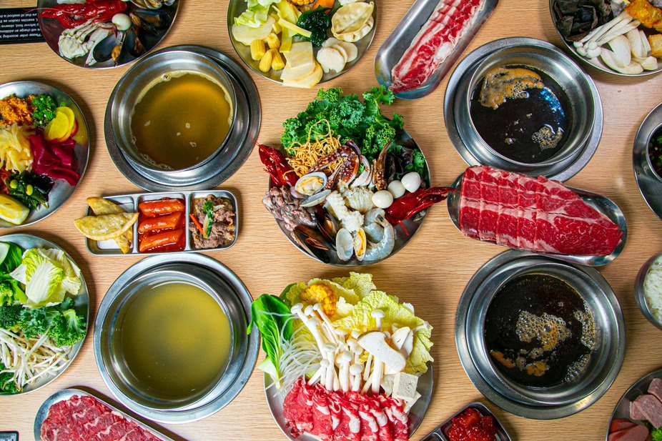 Delight in a vibrant spread of ingredients for a flavorful dining adventure. 🍲 #SanBernardinoEats #GourmetDining #HotPotExperience #CreativeFood