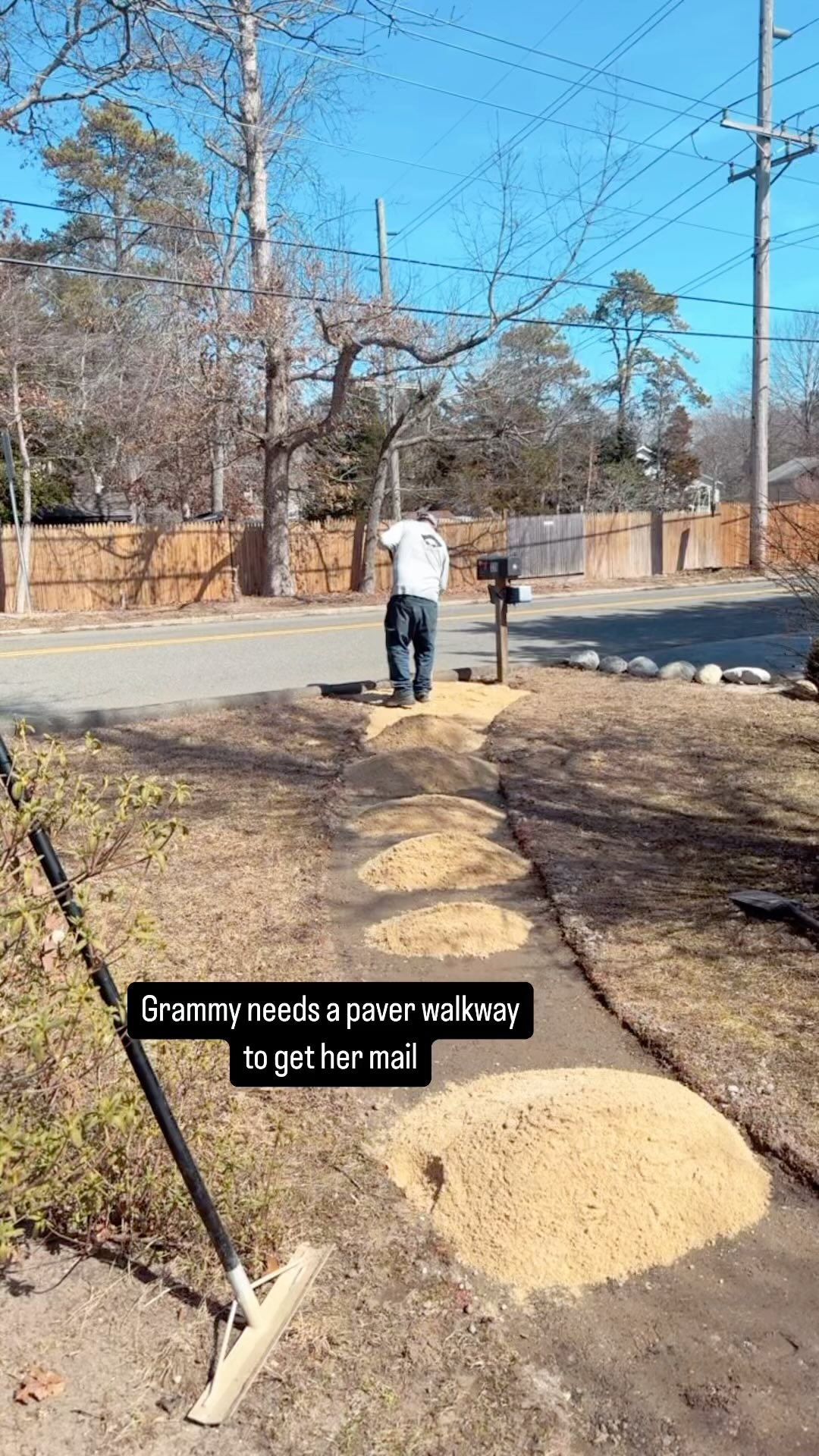 Plant some box woods , spread some topsoil on the edges and Grandma is stylin to get her mail!