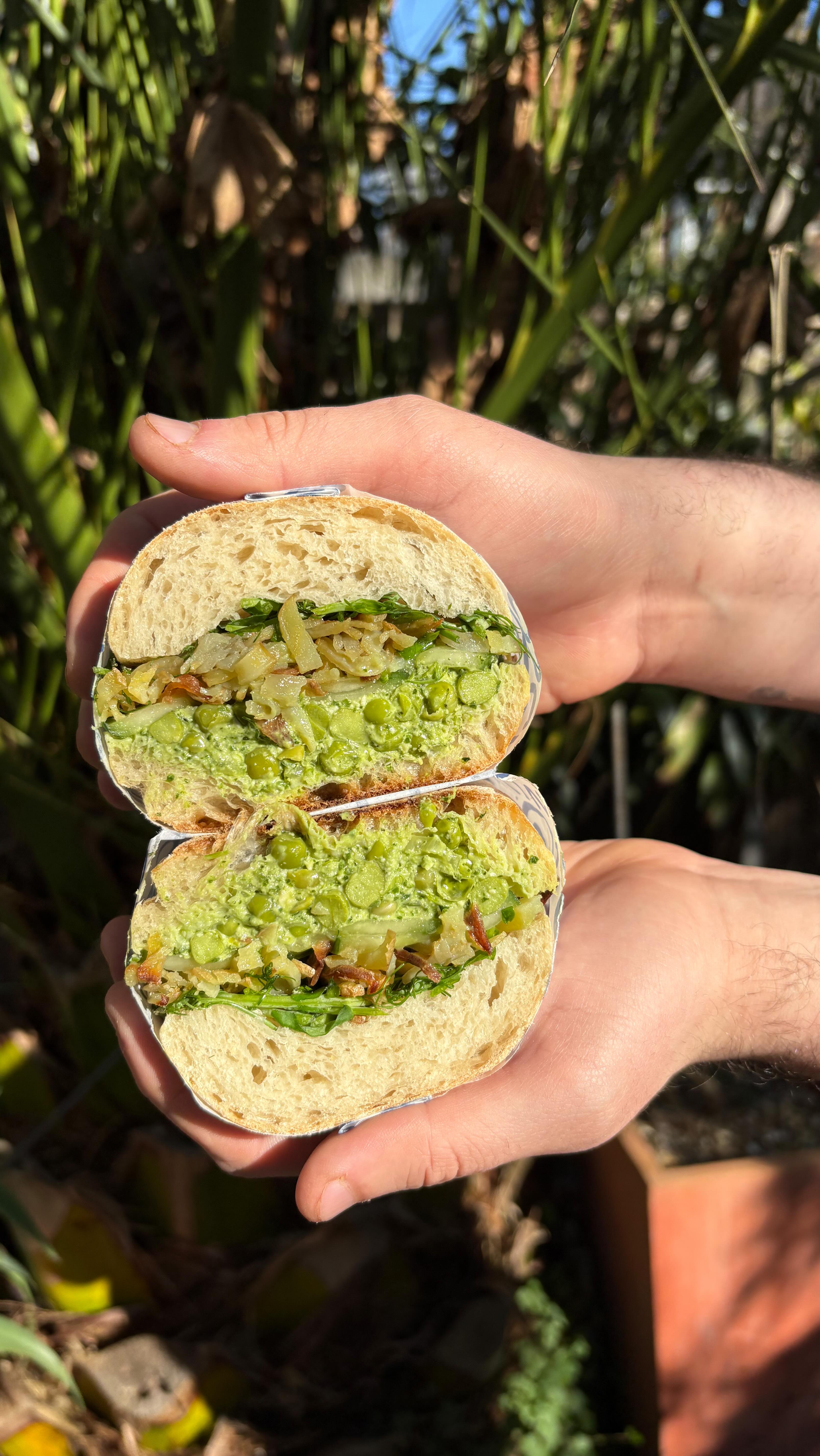 The Green One 💚🌿🌱🍃🟢❇️🫛 garden peas, cucumber, celery, pea shoots, green sauce, cashews, and matchstick potato, all on ciabatta! get ready for spring with this one 🙂↕️