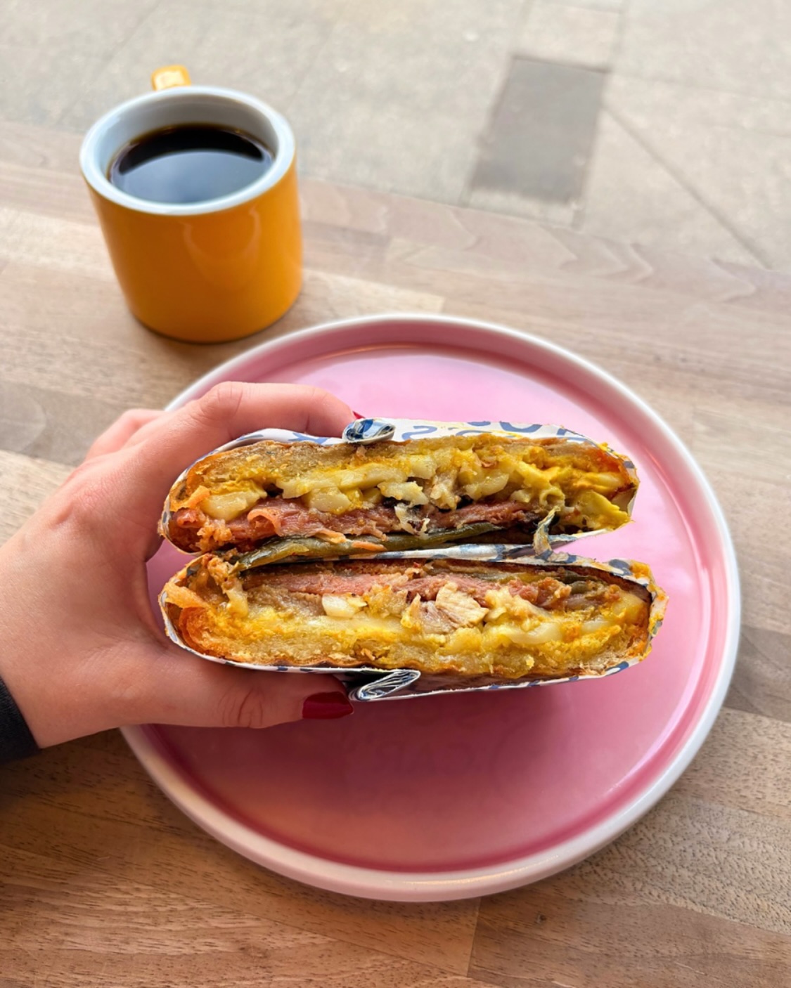 Introducing El Cuban-ish‼️ Inspired by a cuban sandwich, it’s loaded up with slow roasted mojo pork, prosciutto, n’duja aioli, mustard, pickles, and provolone. Get it toasted & enjoy 😋