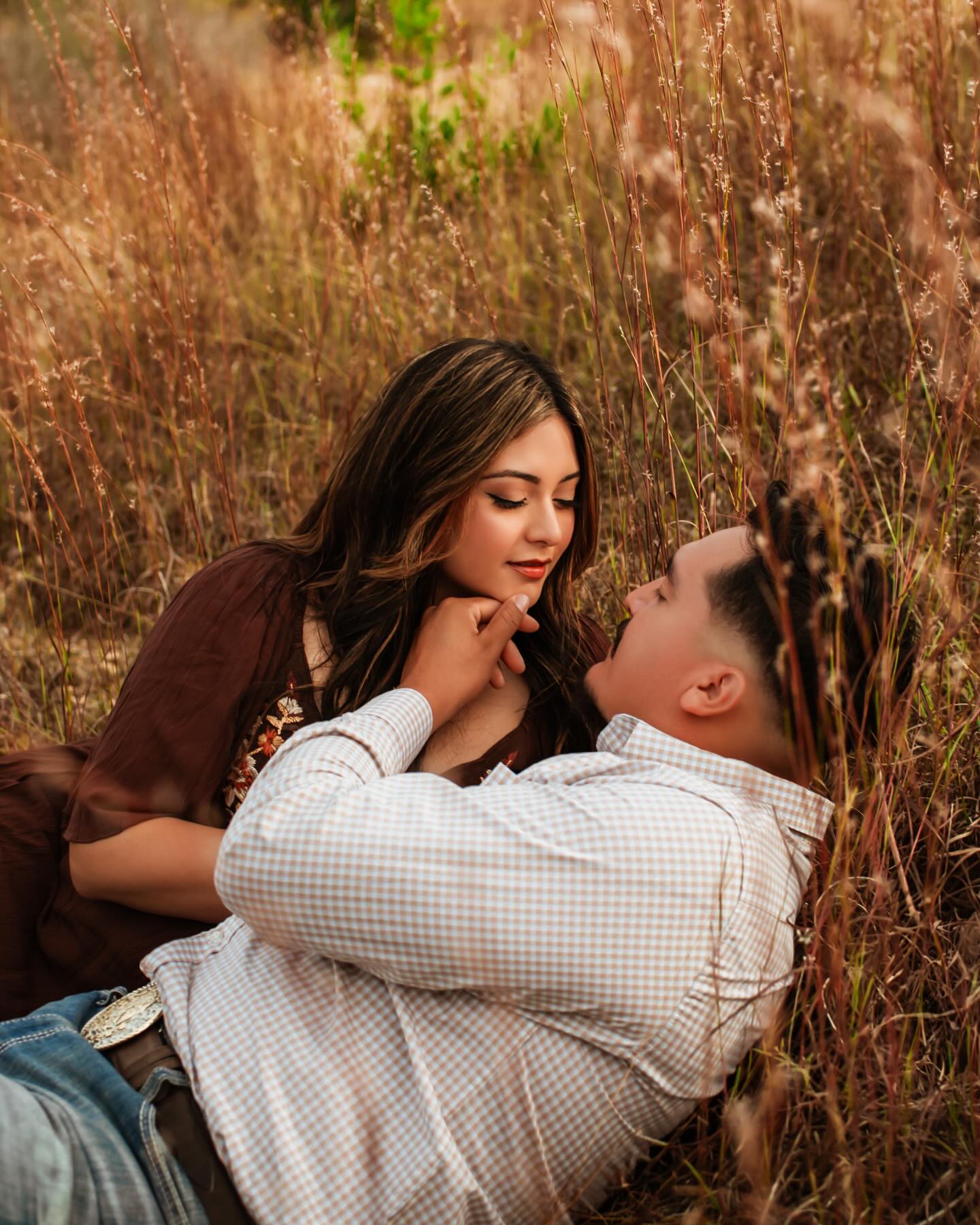 The Castillo’s 🌾
This is a reminder to grab your lover, put your fav cowboy boots on and then hire me to capture every sweet moment! 🤭
They deserve all the applause because they were down to lay on the golden fields and I’m so happy they did, like look how stunning!! Ahh can’t get over these two and these photographs! 🥰