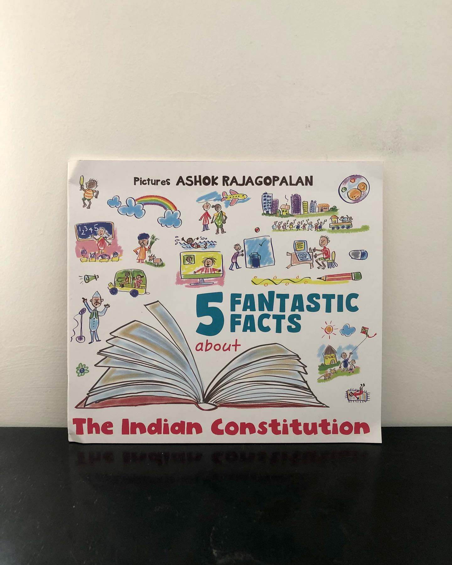5 Fantastic Facts About the Indian Constitution
Illustrated by Ashok Rajagopalan
This was one of the books I was most looking forward to. The topic intrigued me, and I was excited to see Ashok Rajagopalan’s much-loved art bring it to life for young readers. Alas, none of that was to be had—this is easily one of the most uninspiring books I’ve read in a while.
The Constitution of India is a living, breathing document—one that shapes our nation and its citizens. It is also one of the most complex legal texts in the world, reflecting the diversity and depth of India itself. This book, however, takes a completely different approach, using a YouTube video by an actor as its foundation. While the video itself is engaging, adapting it into a book for a younger audience without reworking the content has resulted in something uninspired and, frankly, uninteresting.
The artwork is possibly the book’s saving grace, with plenty of intricate detailing. But even that struggles under the weight of an uninspired narrative. The book only finds its footing in the very last section—where it breaks free from the video’s influence and introduces original content. The included activities and prompts are fun, engaging, and serve as great conversation starters, but it’s unfortunate that the book only finds its voice at the very end.
For those hoping this book would explore the complexities of India’s Constitution—its creation, the people behind it, its evolution over time, and its significance today—this is not the book for you. Instead, it offers surface-level trivia, like the fact that India’s Constitution is the longest written one in the world, without ever delving into the “why” or “how.” And that is where it ultimately fails.
Writing non-fiction for children is a unique challenge—one that requires balancing accuracy with engagement. Unfortunately, this book falls short. If you’re looking for easily accessible trivia, you might find some value here. Otherwise, it’s a pass.
Ideal for ages 5+, but honestly, I wouldn’t recommend it for any age group.