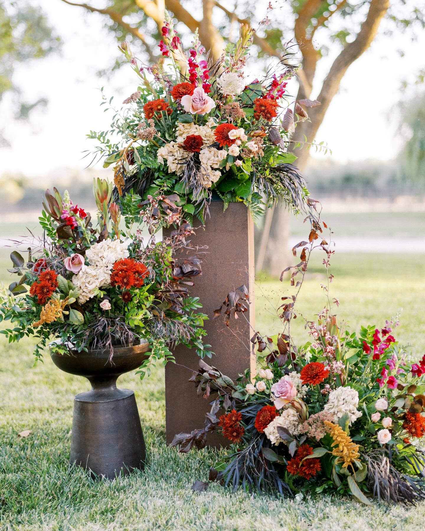 Something a little different than a traditional arch for ceremony! I love pieces like this because they can be easily repurposed to the reception 🍂
Venue
@mjmchangdler
Planner/Designer
@heritage.west.design
Coordinator
@blushandtwinedesigns
Caterer
@trumpetvinecatering
Caterer
@oldslobbq
Bar
@copperandcrystal
Rentals
@allaboutevents
Rentals
@avenuetwelve
Rentals
@scout_rental_co
Photo
@heathermorgan.co
Photo
@leanamyraphotography
Cinema
@patmanang
Florist
@brookeedelmanfloral
Entertainment
Beauty
@anna_lent
Dessert
@craveminidonuts_arroyogrande
Dessert
@mymamasmacarons
Stationary/Signage
@announcementsbyadrienne
#weddingflowers #ranchwedding #winerywedding #pasorobleswedding #pasoroblesweddingflorist #weddingceremonyflowers