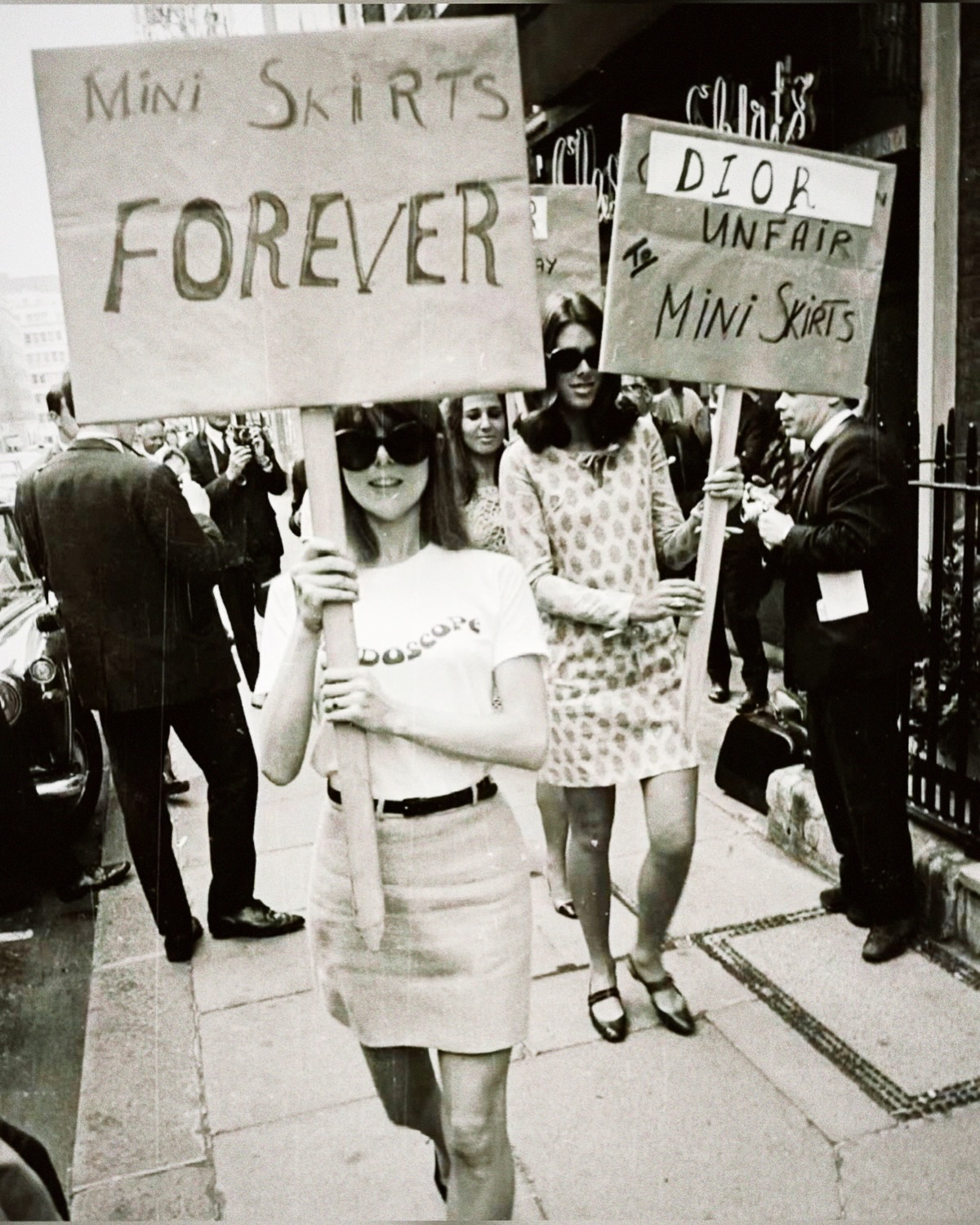 Members of the British Society for the Protection of Mini Skirts, or the BSPM, are photographed here in 1966 protesting Dior’s lack of representation for the rising hemline on their latest runway. #fashionhistory