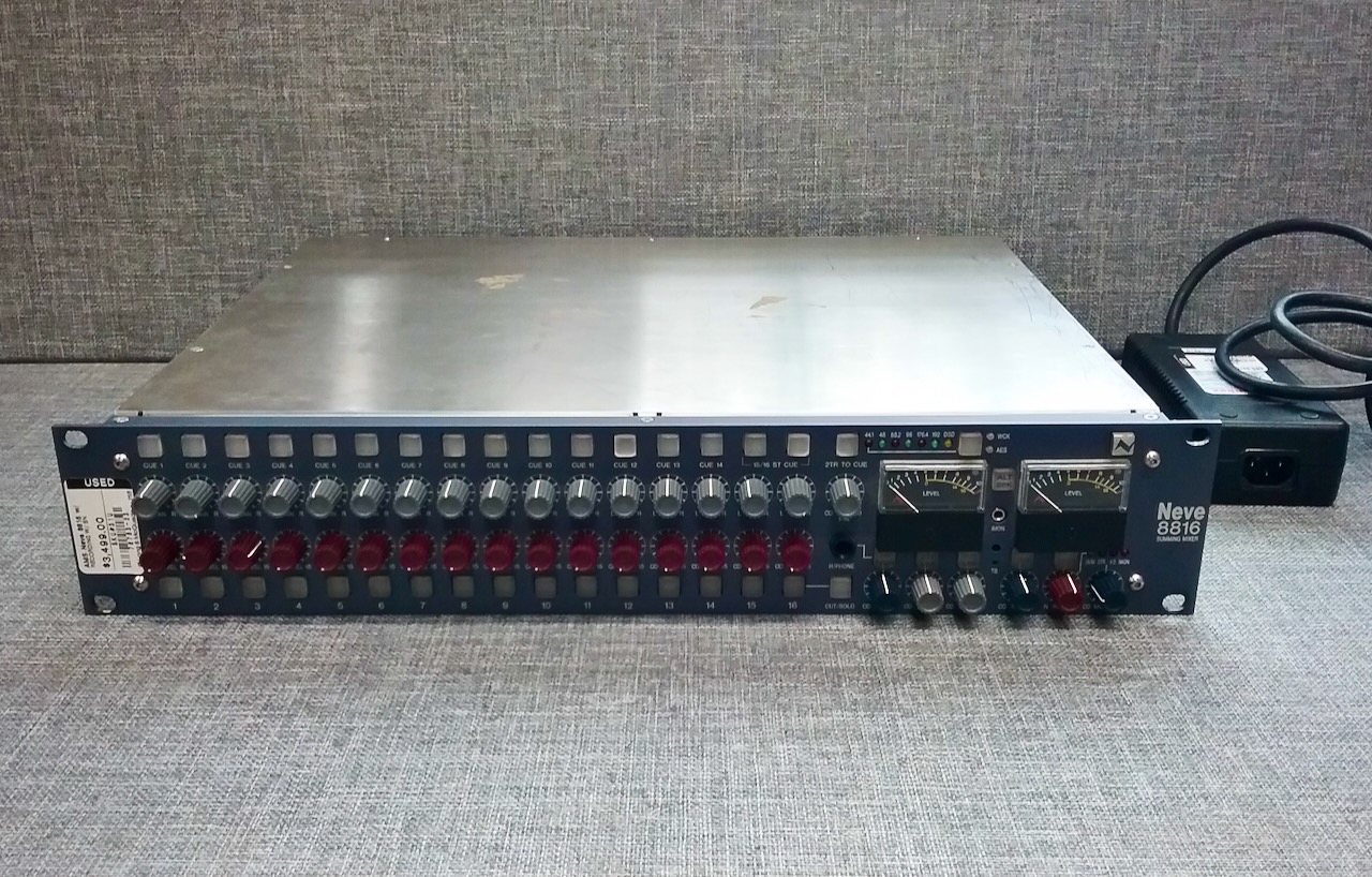 Hi everyone, just thought we'd let you know about a great little gem we have up on our Gear Hunter page! This one is a standout for a couple reasons. First it's an AMS NEVE 8816 Summing mixer, and 2nd, we don't usually carry AMS Neve products, so here's a great opportunity to get an AMS Neve with all the service & support that L&M is known for!
Check it out: https://www.long-mcquade.com/GearHunter/802474/
The Neve 8816 is a 16-channel summing mixer that delivers the iconic Neve sound in a 19” rack format. It uses the same topology as the classic 80 Series console, featuring dual Marinair® transformers on the stereo bus output.
With active summing, the 8816 provides up to +15dB of gain for its 16 balanced inputs. Its voltage mixing design, pioneered in early Neve® 80-series consoles, drops output to around -80dBu (similar to microphone level) and boosts it through the transformers to drive the final output stage.
Ideal for small studios, the 8816 offers Neve® console features like independent cue sends, multiple headphone connections, and a built-in talkback system. Its enhanced summing features include cut/solo switching, rotary pan control, and S-Law shaping for accurate panning.
The 8816 integrates monitoring controls, eliminating the need for a separate monitor controller. It includes dual loudspeaker outputs, multiple monitoring sources, and a 3.5mm mini-jack for external devices.
It features two stereo bus inserts, one with a blend function for parallel compression, and a mid-side processor for separate mono and stereo signal processing. The stereo width function adjusts the stereo image.
For hands-on control, pair the 8816 with the 8804 fader pack or link multiple units via the 2-Track bus feature. Session recall is easy via USB with Neve® Recall software.
An optional A/D conversion card offers stereo digital output in AES 3 and DSD formats with sample rates up to 192kHz and clocking options via AES Sync or word clock BNC.