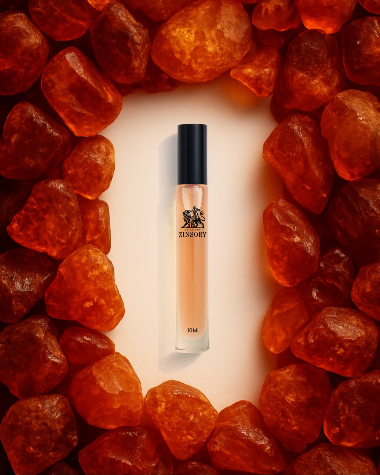 Sweetness of boozy amber and the orient super concentrated and packed into an elixir, a forbidden sparkly raspberry and rum opening dance that slowly reveals its warm and fierce heart.
BROWN AMBER
I’ve been always on a hunt for a true intoxicating amber, there are many undisputed gems of the amber world but I still could not find what the deeper part of ME wanted, so I decided I had to be the one to create it. On my 2023 trip to BeautyworldME in Dubai, I decided to visit the well known naïf souq, where you find basically everything you can think of, from rugs to perfumes to car parts. I decided to test as many fragrances as I can while there, one thing I fell in love the most is the way the amber is executed, it’s very deep, sweet, resinous and it does it in such a balanced way, but to me it was always missing a sparkle, a hook so to say to really keep you by coming back for more, in Brown Amber, I combined the raspberry, rum, nutmeg, cinnamon and almond to create a scent that is very well known, consider it an accord that falls apart in the development of the fragrance to reveal each individual note, I’ll leave it to you to decipher and interpret it as your nose likes :), in the heart the honey and white rose shine through but I made sure the rose stays drowning in the honey and amber, so that it remains a nuance and not a main player, and finally, the black pepper and sandalwood give the amber and oud accord in the base a nice smooth kick.
To me, this perfume really captures my trip to Dubai, you walk around, smelling many resins, perfumes, bukhoor, then you want some refreshment, you grab something cold and sparkly to drink, you continue wandering out, with a new scent hitting your nose every step. The humidity, how sticky the weather gets sometimes, the nightly vibes, I can’t imagine such a country with such energy without amber, oud and resins. I fell in love with the landscape, the people, the vibes, the cities bustling with life and the serenity and peace of the desert at night, and I did not want to let that go so I created Brown Amber to take me back when I’m reminiscing about my times there. And I hope, it can give you a taste of it as well. -Zak