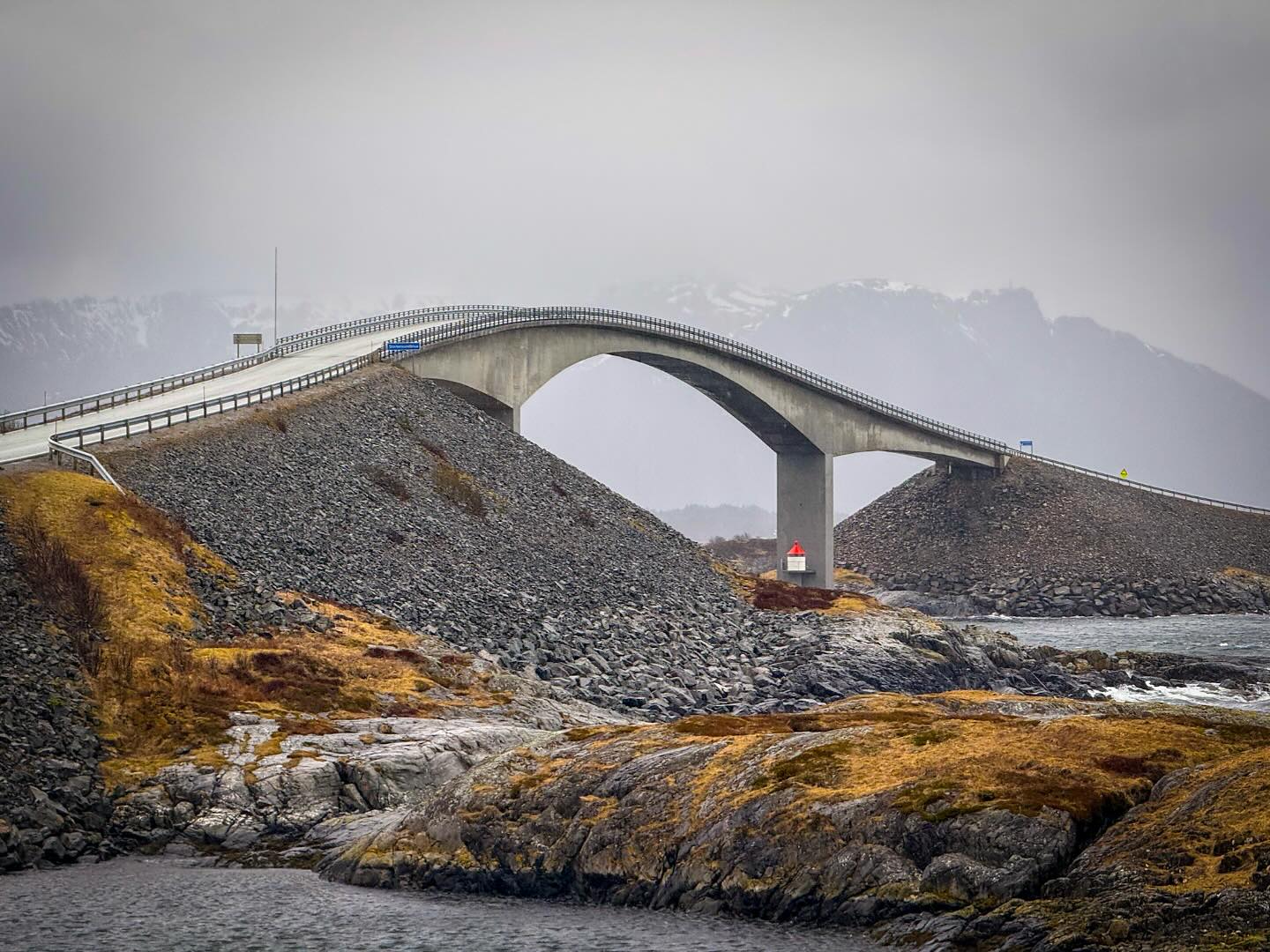 The Atlantic Road wasn't at its photogenic best due to the weather, but the experience was incredible! The sideways rain added an extra layer of difficulty to the hike around the island! 🇳🇴