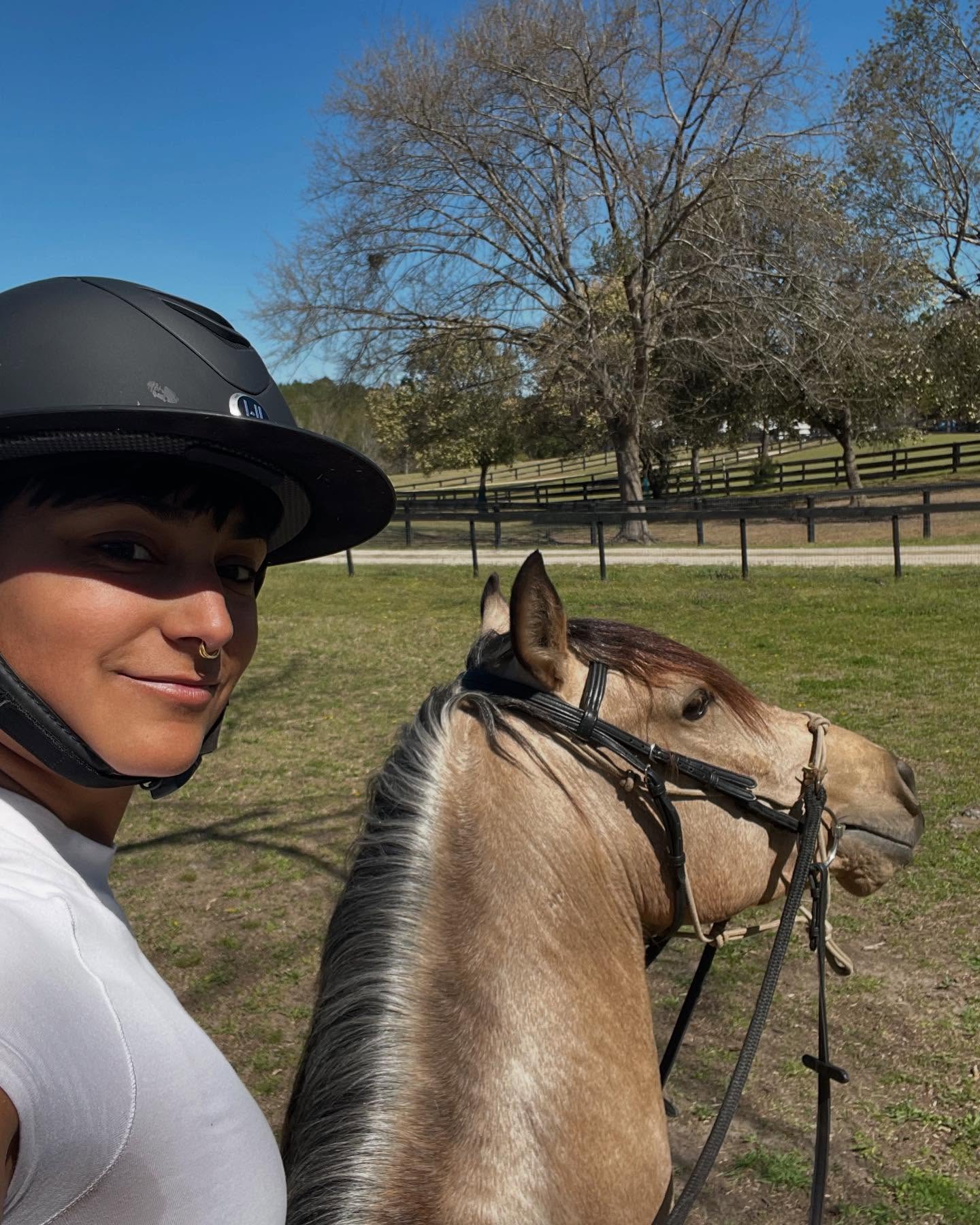 Things I do as a dressage trainer that may be seen as unconventional:
I heavily incorporate positive reinforcement into all aspects of training and have had great success doing so. I think it’s silly that so many trainers and horse ppl in general are against it when it is such a successful method of training. I’ve taught self carriage, walk to canter transitions and so much more via r+.
I ride my horses without nose bands. All of my bridles don’t have nose bands on them, even my double bridle. I’ve seen too many trainers rely on nose bands and flash nose bands to keep their horses mouth shut 🤐
I don’t use side reins in ground work and allow horses to find their self carriage. Reliance on tools does not teach the horse how to move independently.
I allow my horses freedom in movement and exploration in what they are doing. It creates stronger and more balanced horses.
I love working them and riding on uneven ground and slight slopes! Though a perfectly manicured arena is great for practicing your tests, it isn’t great for building sure footed horses. Variability in surfaces create sure footedness and strengthens soft tissue.
I often start young horses in a rope halter/cavesson and bridle so as not to cause distress in learning to be comfort with the bit. Bits are not tools for control, they are for delicate communication on both the horse and riders end and should always be handled in a delicate way.
I only strive to get to a show when I know that my horse is ready, I never try to force it to happen. Honestly the journey in training is much more rewarding to me than showing will ever be. Though I do think it’s fun to get out there, I will never do so at the expense of my horse.
No horses are kept in isolation, even my stallion goes out with another horse. Socialization should never be taken away from them.
I do not exclude my culture and spiritual practices from what I do with the horses. They are huge influences in who I am as a person and so it only makes sense that they play a big role in how I am with the horses ❤️
Any of this resonate with you?
#classicaldressage #dressage #dressagehorse #pocequestrian