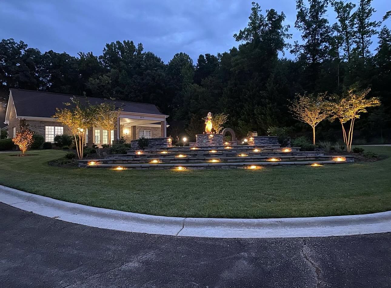 The beautifully lit exterior of Villa Magnolias Event Center exudes elegance, with a tiered stone fountain and glowing uplights creating a warm, inviting ambiance. Nestled against a wooded backdrop, the venue offers a serene and picturesque setting perfect for evening events.
#weddingvenue #greensboronc #greensboroweddings #outdoorweddingnc #ncweddings #ncweddingvenue