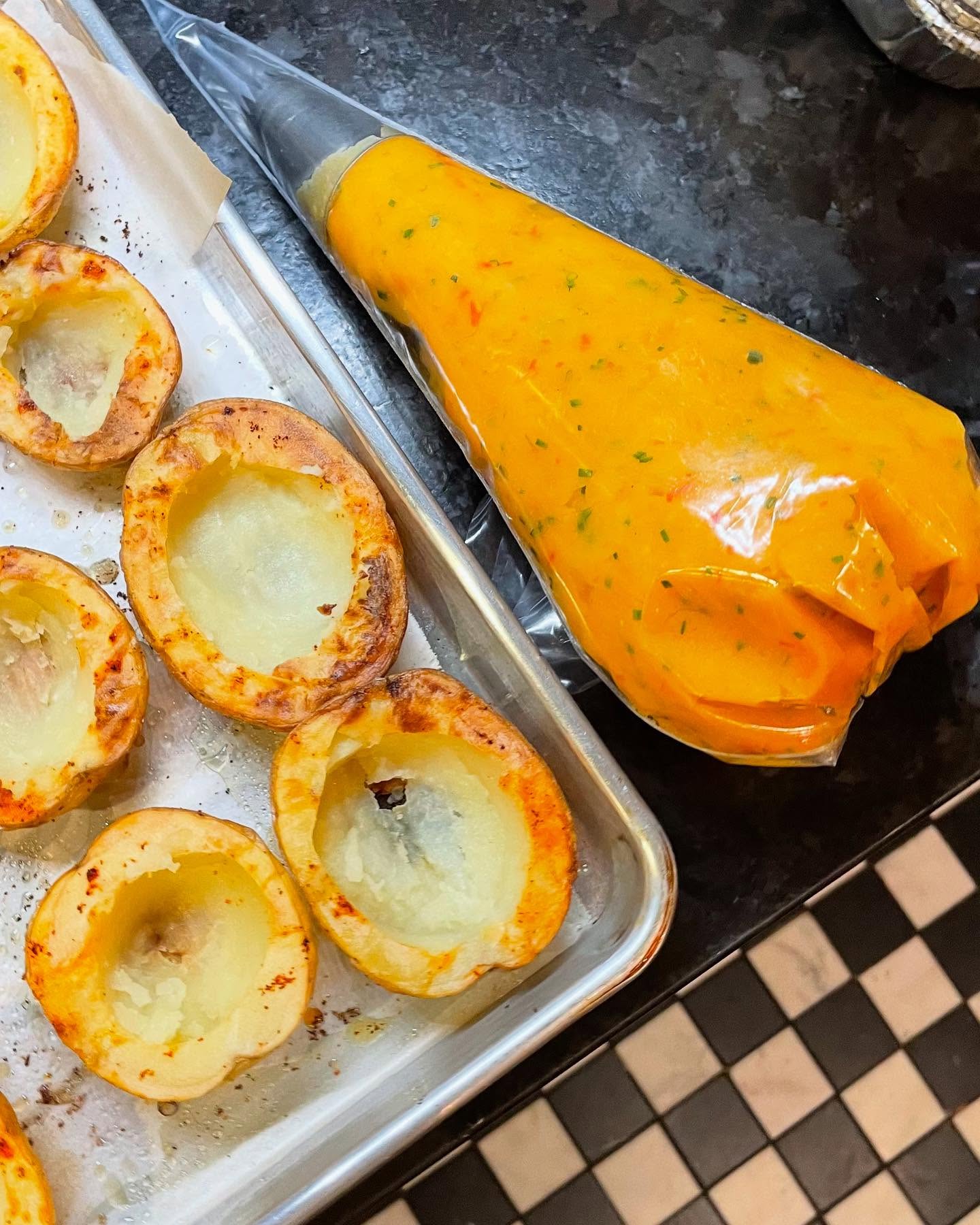 Diablo Potatoes (Tunisian Style)
Chef Itai’s take on deviled eggs—only better. Vegan, carb-loaded, and a total showstopper. Think crispy-on-the-outside potatoes filled with their own creamy insides, kicked up with harissa, olive oil, garlic, and chives. A must-have at our events. Because honestly—what’s better than a potato? A potato filled with itself. 🌿 #YallaMarVa
#DiabloPotatoes #VeganBites #CarbLoversUnite #TunisianFlavors #HarissaHeat #PrivateDining #ChefLife #ViralEats #FoodieFavorites #MarvaDining #PotatoLovers #FarmToTable #CrispyPotatoes #VeganSnacks #FoodReel #DinnerPartyInspo #EpicEats #ComfortFoodGlowUp #SavoryVibes #FoodWithSoul #MiddleEasternFlavors