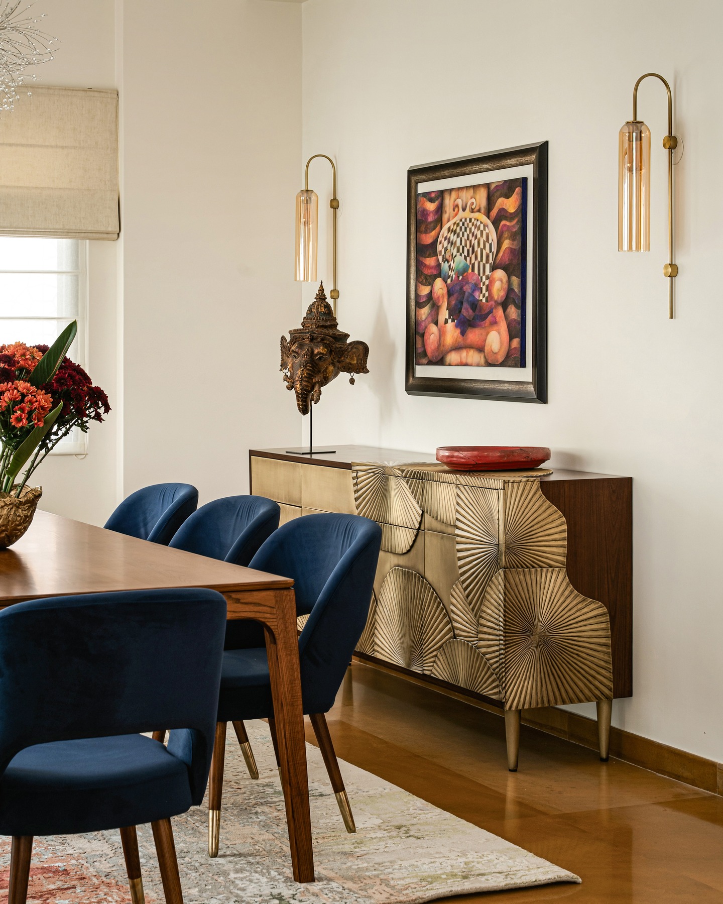 Project Thuzha: The Dining Area
The dining area exudes understated elegance- the muted color palettes serve up as the perfect staging for pieces of high craftsmanship - a novel ethnic mask, a sculptural console in brass, an intricate yet majestic chandelier of crystals woven with gold. Traces of beige and gold in the upholstery and furniture details tie the aesthetic together seamlessly.
Design and execution : Furbishy
Photography : Nayan Soni @nayansoni21
Cinematography: Create Stories @createstories.in
Styling : Shivani Raina @theshalomhome