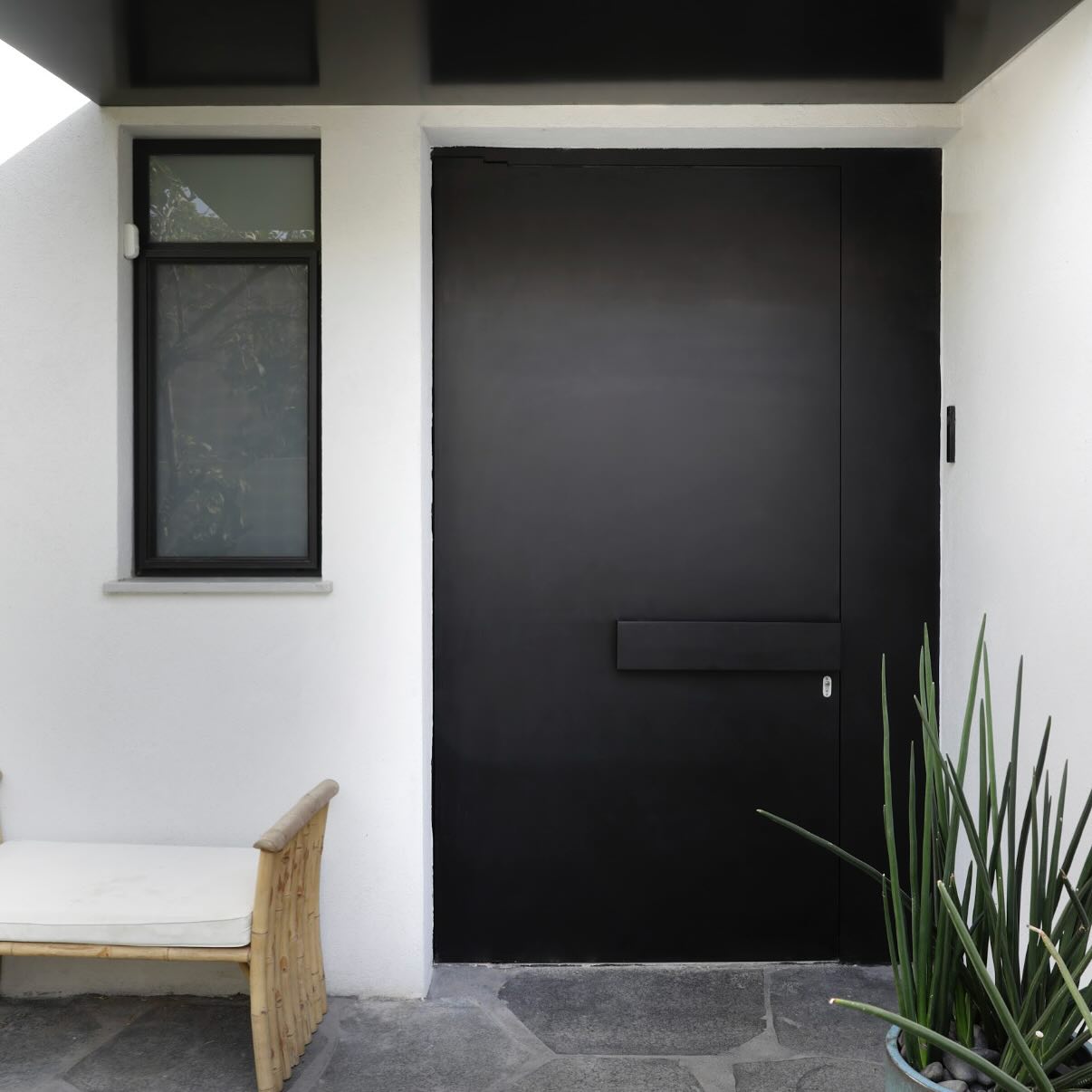 A bold black entrance