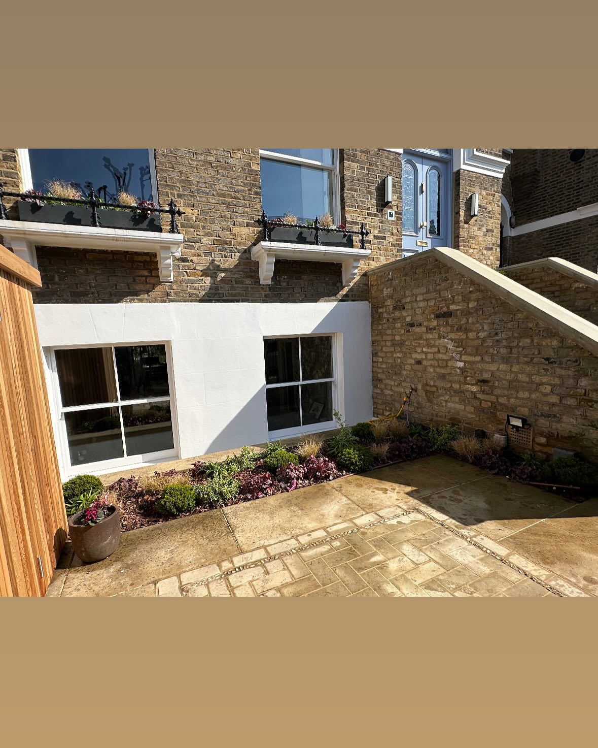 Client wanted to house their 5 bikes and many bins whilst creating a space where they could enjoy the evening sun. #frontgarden #bikestorage #frontgardenmakeover #planters #yorkstone