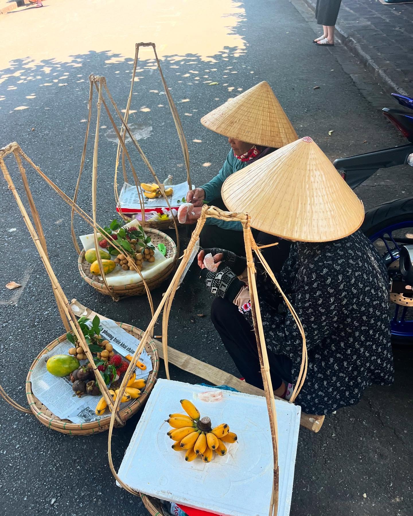 Resting after a day of carrying the rich flavors of Vietnam, one step at a time 🍉🌾
#VietnamTradition #StreetVendors #VietnameseLife #LocalTraditions #AuthenticVietnam #TravelVietnam #CulturalExperience #HardWork #ExploreAsia #hộian #hoianancienttown #VietnamCulture