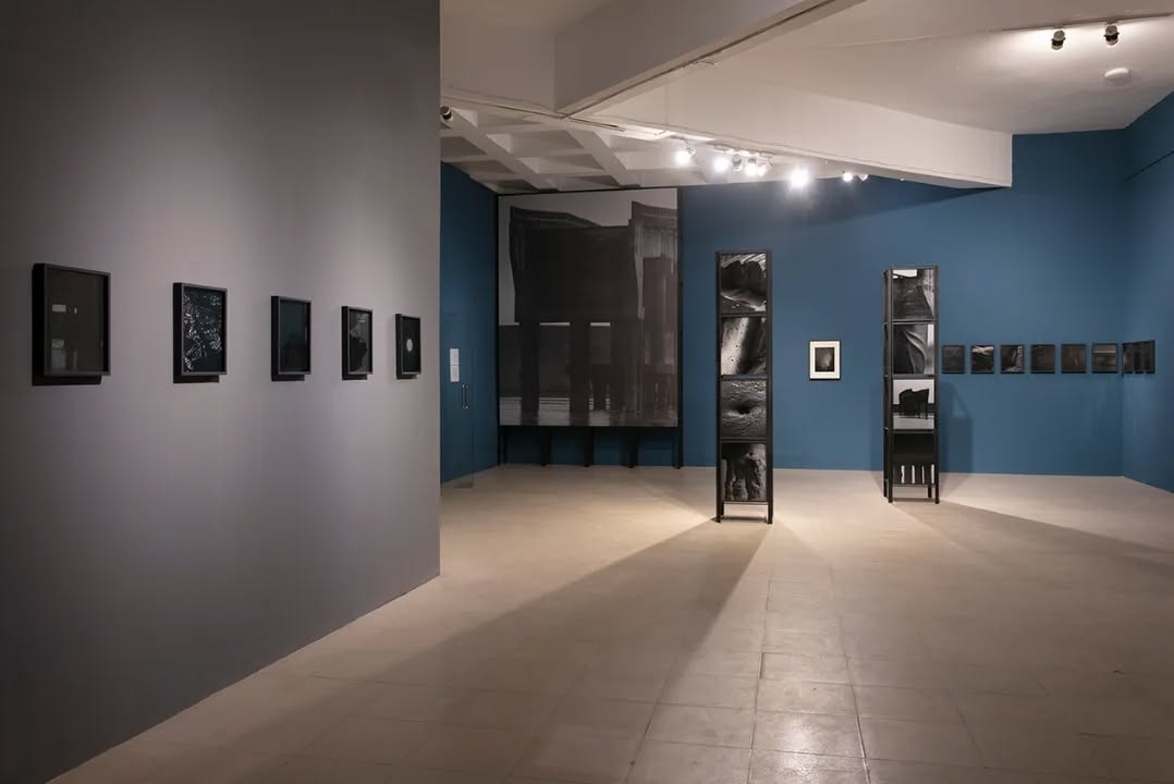 #ThrowbackThursday
Today, we look back at the work 'পতন / Collapse, 2021-2023' by Munem Wasif from DAS 2023.
Munem Wasif explores the conflicted relationship between the idea of development and the larger ecosystem. On one side flows a mighty river, while on the other stands an intrusive structure made of rods, cement, sand, and stones. In these photographs, we see a man-made structure—geometric, brutal, and monumental in scale—standing tall against the vigorous currents of the Jamuna River, which race horizontally amidst the soft and fragile elements of nature.
Bangladesh is born out of the nerves and veins of numerous rivers. However, neo-liberal development processes over the last few decades have neglected the natural flow of water, the climate, and the lives dependent on these areas. With human-centric notions of development, economic gain, and the consumption of natural resources as the basis of modern life, the voices of other species have been excluded, resulting in a consequent loss of biodiversity.
Through the juxtaposition of horizontal and vertical axes, Munem Wasif’s image-based installation reveals a contradictory tale of climate, life, nature, and development. One can’t help but ask: *What is the true definition of development?*
Photographs of পতন / Collapse, 2021-2023 by Munem Wasif from DAS 2023
Spatial design in collaboration with Architect Salauddin Ahmed
Archival pigment prints, variable sizes
Metal structures, wooden frames
With additional support from the Samdani Art Foundation
Courtesy of the artist and Project88
@dhakaartsummit
@samdaniartfoundation
@nadiasamdani
@rajeebsamdani
@dhakadiana
@rux_q
@munemwasif
@swilin_haque
@sazzad1985
@iftekharnoor
#dhakaartsummit #samdaniartfoundation #dhaka #sylhet #art #artwork #DAS #exhibitions #contemporaryart #srihatta #artistresidency #sculpture #SAF #munemwasif