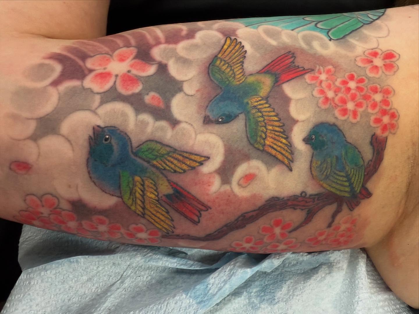 Three little birds are fresh finishing off a half sleeve with a pheonix (healed and settled cover-up)…