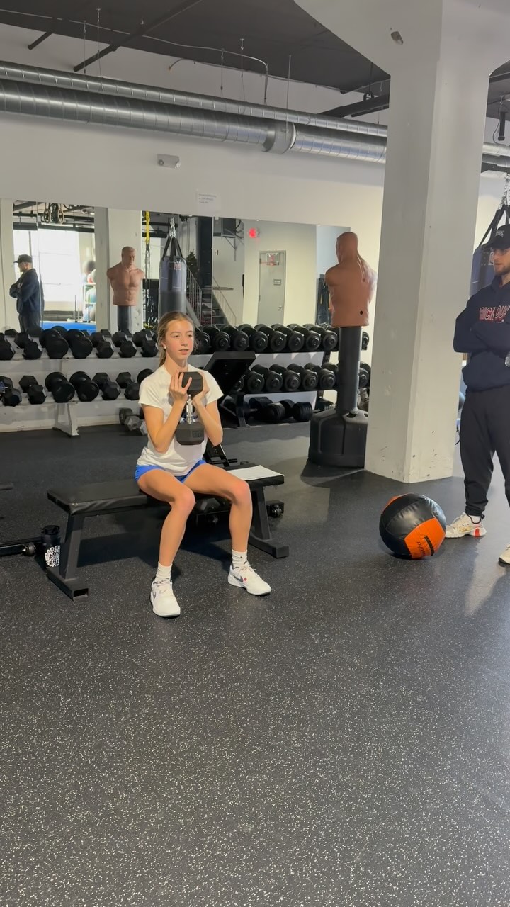 @coachdoss_ is pumped to start working with Kennedy Gill—a driven young lacrosse athlete with deep roots in the game. Her father was a standout at the University of Virginia, and she’s now chasing that same D1 dream. We’re honored to have her family’s trust in guiding her development.
Right now, our focus is on building a strong athletic foundation through fundamental movement work.
• Goblet squats: reinforcing lower body mechanics, improving trunk stability, and teaching proper squat patterning under load.
• Eccentric push-ups: building control through the upper body and shoulder girdle while increasing time under tension for strength gains.
• Med ball power throws: translating strength into explosive rotational power—essential for shooting and quick directional changes on the field.
Kennedy brings the right mindset, strong family legacy, and a relentless work ethic. This is just the beginning—and we’re excited to be part of the journey.
#PipehitterTraining #LacrossePerformance #D1Bound #AthleteDevelopment #SportsScience #WomensLacrosse #LegacyDriven