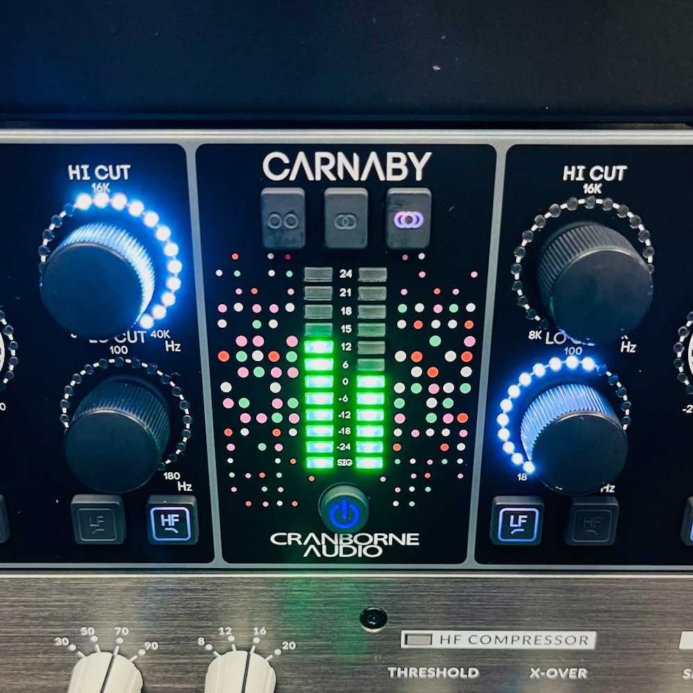 Discovering the @cranborneaudio Carnaby HE2: A Colorful Game-Changer in the Rack
Stumbling over an old pair of sneakers in a dark hallway? Annoying—and usually painful. But stumbling across the Cranborne Carnaby HE2 in our shop? Pure satisfaction.
As you’ll see in the photos we snapped right here at the shop, our racked HE2 looks right at home nestled between the “Sweet Finisher”— @dangerousmusic Bax EQ—and the ever-vibrant @sslaudio Fusion.
Speaking of vibrant: visually and sonically, the Carnaby HE2 is bursting with color. This isn’t just another pretty face in the rack—it brings something genuinely different to the table.
We happen to have an @manleylabs Massive Passive just a few spaces above the HE2 in the rack. While the Carnaby isn’t meant to compete directly with that silky beast—it’s nearly a third of the price—it delivers unique character in spades. One standout feature? Mid-Side mode. That’s not something you find every day in an analog stereo EQ.
(You’ll notice in our photos: the unit is in Mid-Side mode during this test.)
To put the HE2 through its paces, we ran an upbeat, rootsy passage through it—drums, bass, guitars, and some tasty percussion. Right out of the gate, the HE2’s harmonic EQ design made itself known. It's not just EQ—it's EQ with vibe.
One of the first things we noticed was how beautifully the Side band’s mid boost enhanced the guitar frequencies. From there, we:
• Boosted the top end (14k–16k) on the Sides, while setting a low pass filter just below 16k in the Mid.
• Gave a subtle lift to the snare range below the high cut in the Mid.
• Cut some low frequencies in the Sides and added a bit of low-end punch in the Mid.
• Finally, a slight overall Side boost helped widen the stereo image in a really pleasing way.
The Carnaby HE2 is more than just a tone shaper—it’s an image enhancer, a color box, and a creative tool for mixing and production. It adds edge and excitement, and could be a secret weapon for parallel overheads or stem processing.
Print guitars through it. Add vibe to percussion. Push your stereo image.
The future’s yours to shape—with the Carnaby HE2.
@longandmcquade
