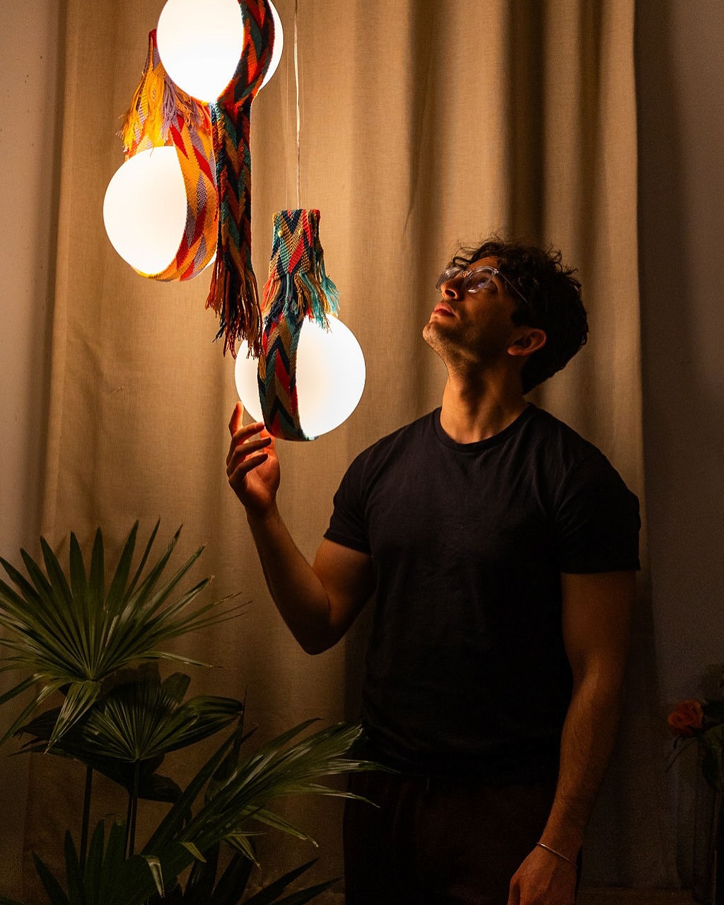 Illuminating Traditions
Wayuu Pendant Lamp
This is the first piece in a series that reimagines Wayuu textiles for contemporary interiors. The lamp features three stacked glass bulbs, each suspended by vibrant straps woven in the traditional Wayuu chevron pattern.
While the original concept used a single color, I chose to embrace the bold, vivid palette seen in their iconic mochilas, highlighting both the visual richness of the craft and the versatility of the design. Each strap becomes a thread of culture, form, and function.
The Wayuu Pendant Lamp is currently on view at the @isola.design gallery for Milan Design Week, open to the public from today through April 13.
Come see it in person at Via dell’Aprica 12!
Photography: @jayevelynstudios
#Wayuu #MilanDesignWeek #IsolaDesign #DesignIsHuman #IlluminatingTraditions #ContemporaryCraft #PendantLamp #CulturalDesign #SocialDesign