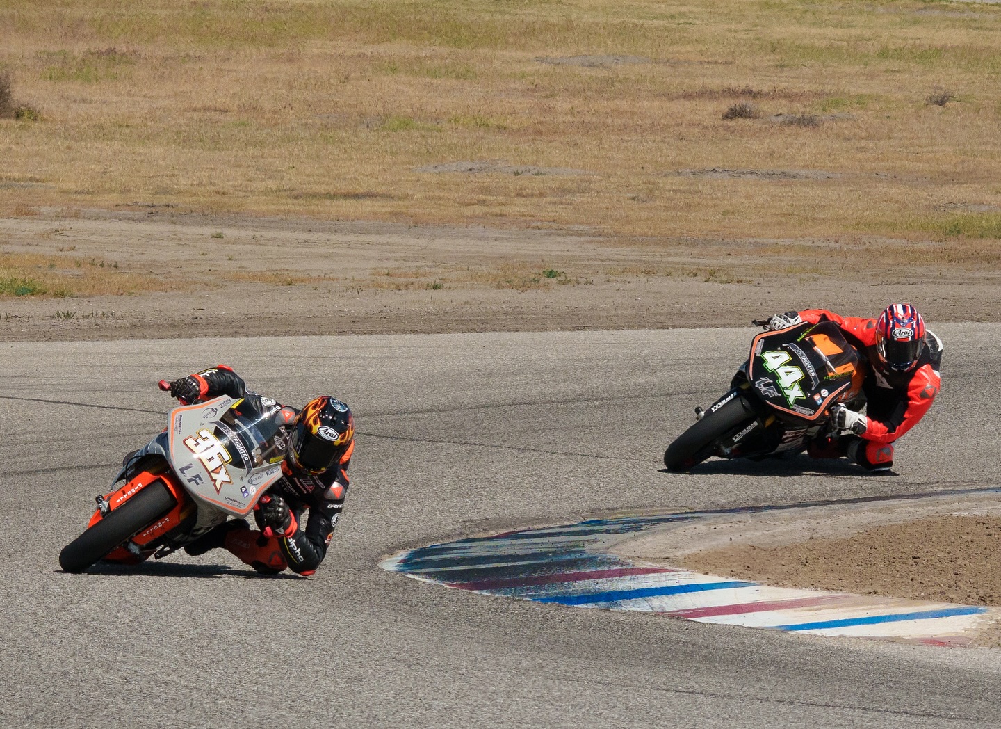 A great start to our 2025 race season this weekend with AFM at Buttonwillow! Jayson and Brenden were in flying formation ripping off fast laps from the first practice on Friday, setting new lap records for us onboard their respective Orange Cat Lightfighter v3 and v2 all-electric race bikes. They took a 1-2 finish in the Middleweight Superbike class as well as overall wins in the new Formula 1 Open Superbike and Formula 2 Middleweight Superbike classes. So cool to watch these pro-level racers push the limits on the bikes we’ve spent years designing and building! Thanks to all who follow and support our journey! 🙏⚡️⚡️⚡️💪🤘 Photo credit: @johnnymemphis