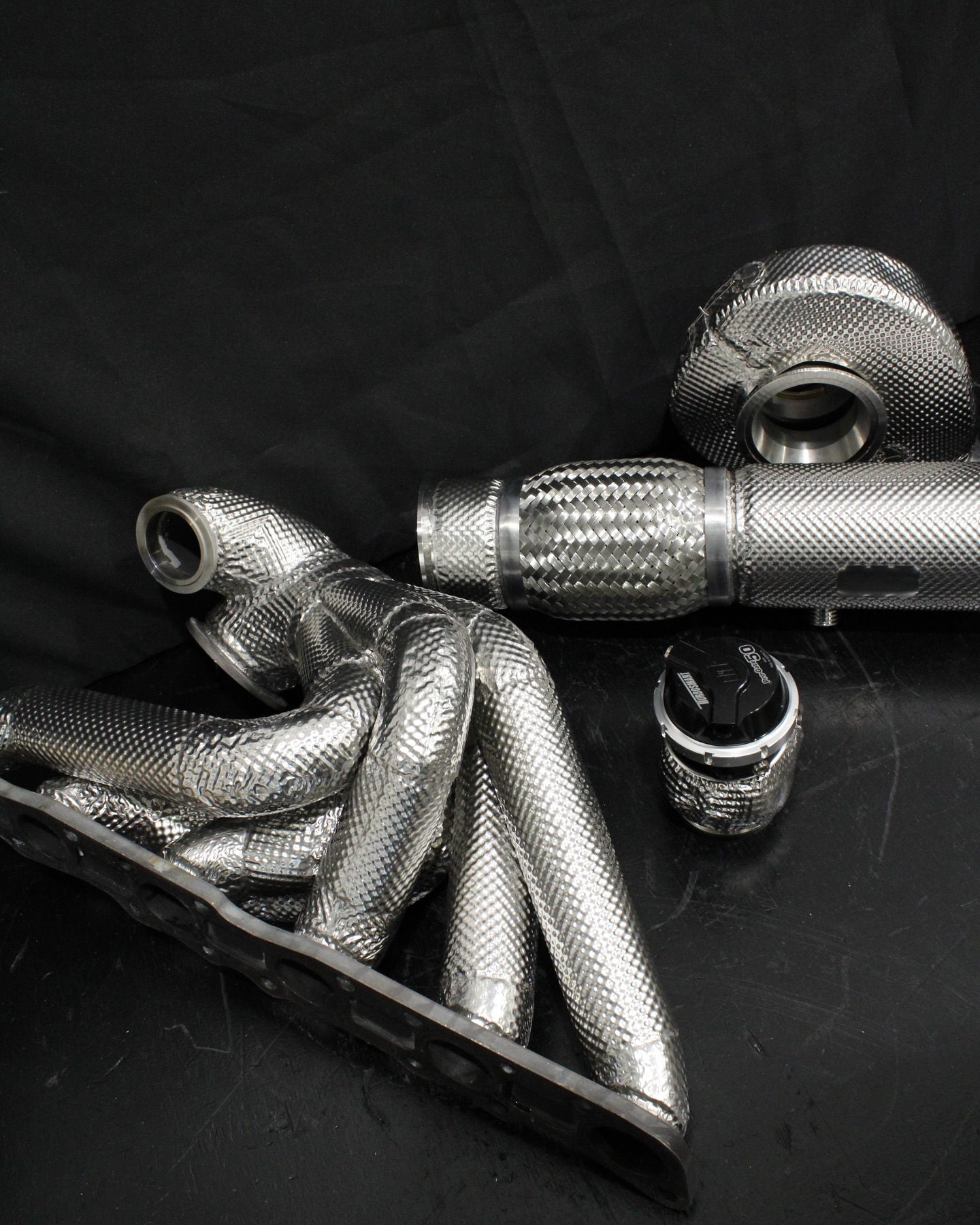We had our friend @r32_samurai_panda come visit us from the States 🇺🇸 to collect his R32 big turbo kit 😎
When you’re building something this serious, proper thermal management is essential.
Here’s what we hooked him up with:
• Welded manifold insulation
• Removable turbine heatshield for that monster @precisionturbo
• Removable @turbosmarthq wastegate heatshield
• Welded downpipe insulation
This setup not only keeps temps in check, but also makes swapping out turbine housings or wastegates way easier, no need to redo insulation every time.
Got a big build in the works? Let’s make sure it’s running cool and clean.
Drop us a message — we’d love to chat.
📩 info@immico.co.uk
📲 Slide into our DMs
☎️ 01923 275162
#r32 #turbo #precisionturbo #turbosmart #motorsport #insulation #heatshield #thermalmanagement