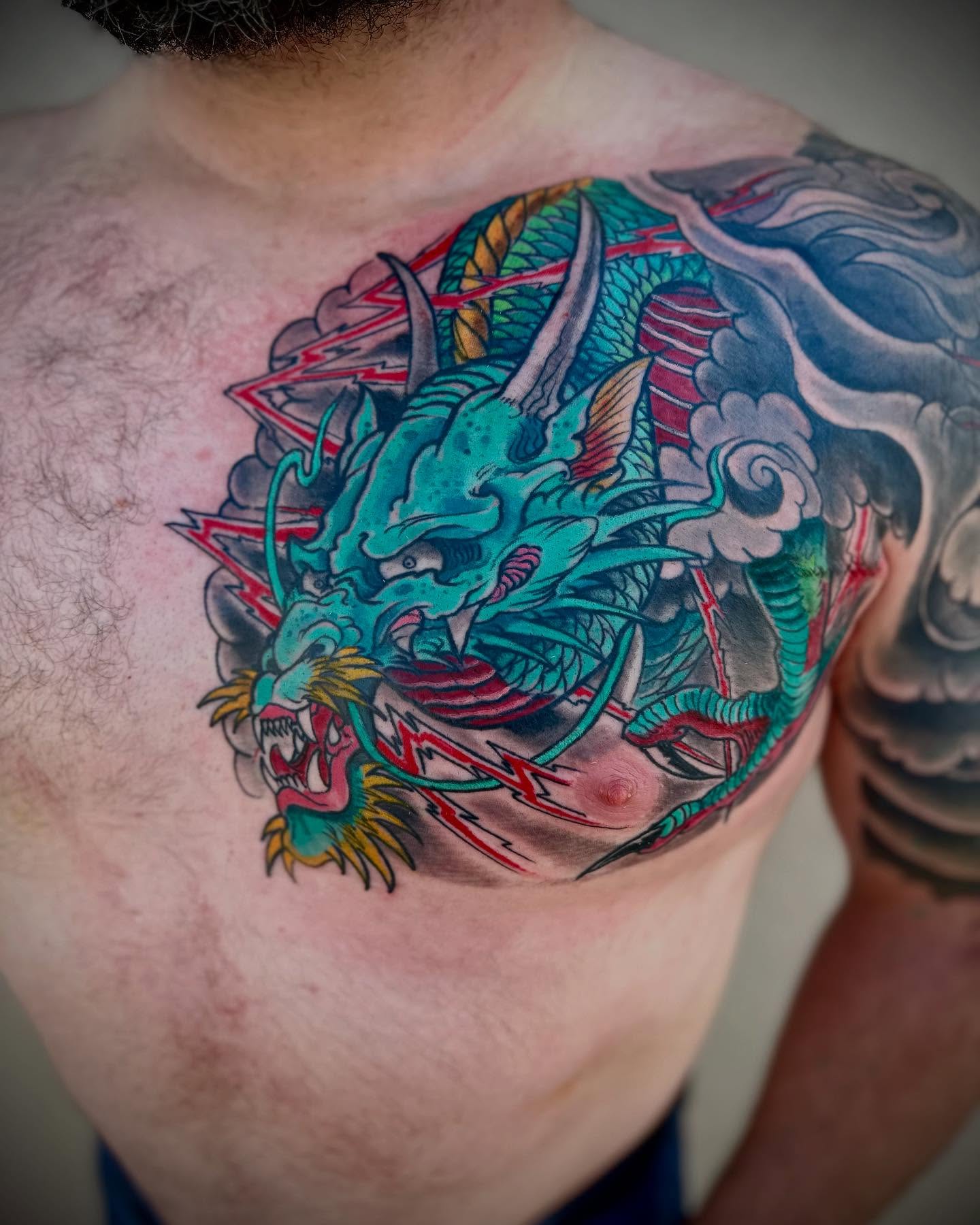 Super fun chest piece action on Edā¦.. dine by Johnny #japanese #Dragon #AlbuquerqueTattoos #JapaneseDragon #AlbuquerqueTattooArtist #AlbuquerqueTattooShop #TrueGritTattoosNewMexico #CanātStopWonātStop #Tattoos #MenWithTattoos #Awesome