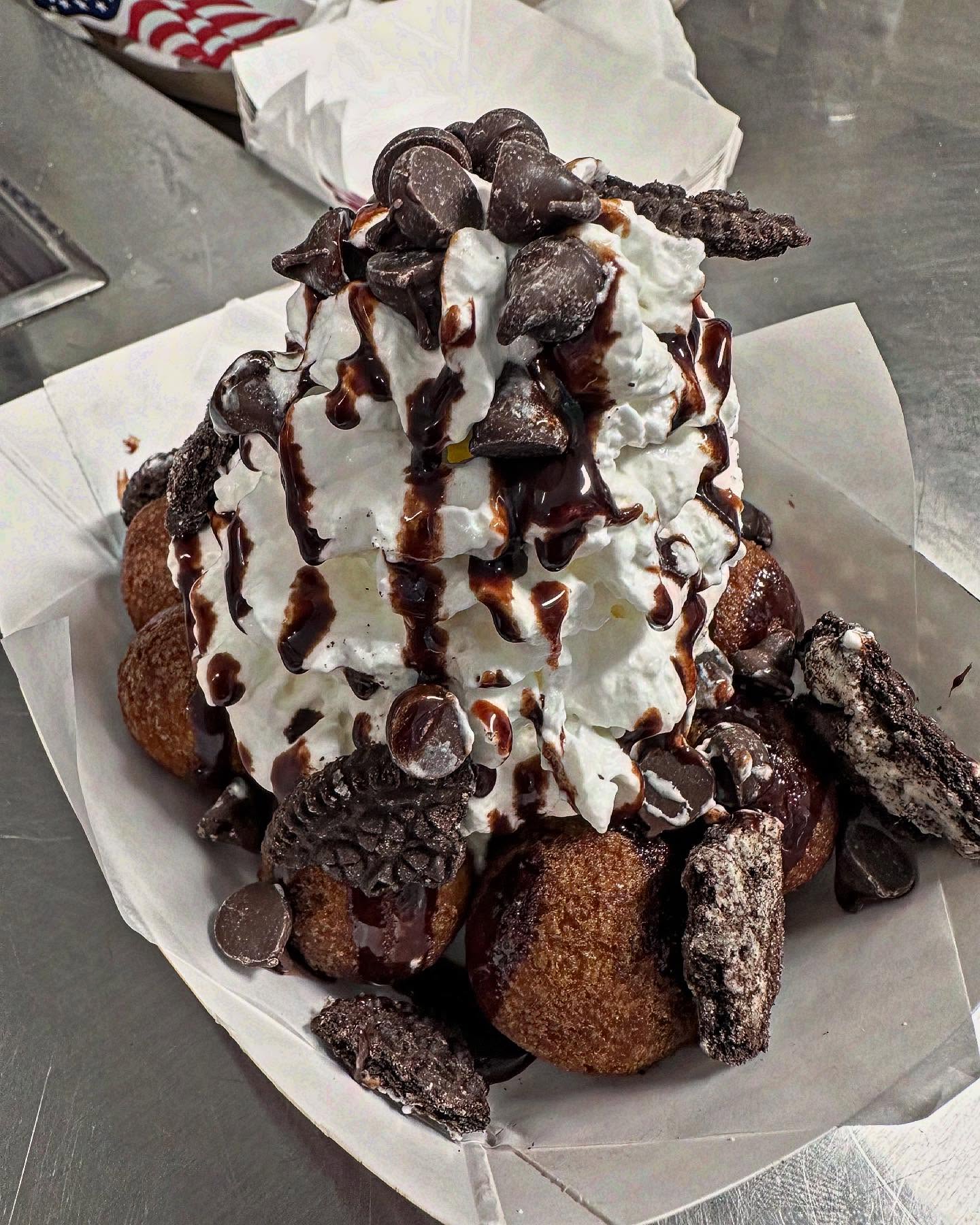 Our Mud Pie Specialty Donut Boat
Donut Holes, Ice cream, Whipped Cream, Chocolate Chips, Oreo Crumbles and Chocolate Sauce. All Piled High!!
#donutholes #mudpie #oreo #dessert