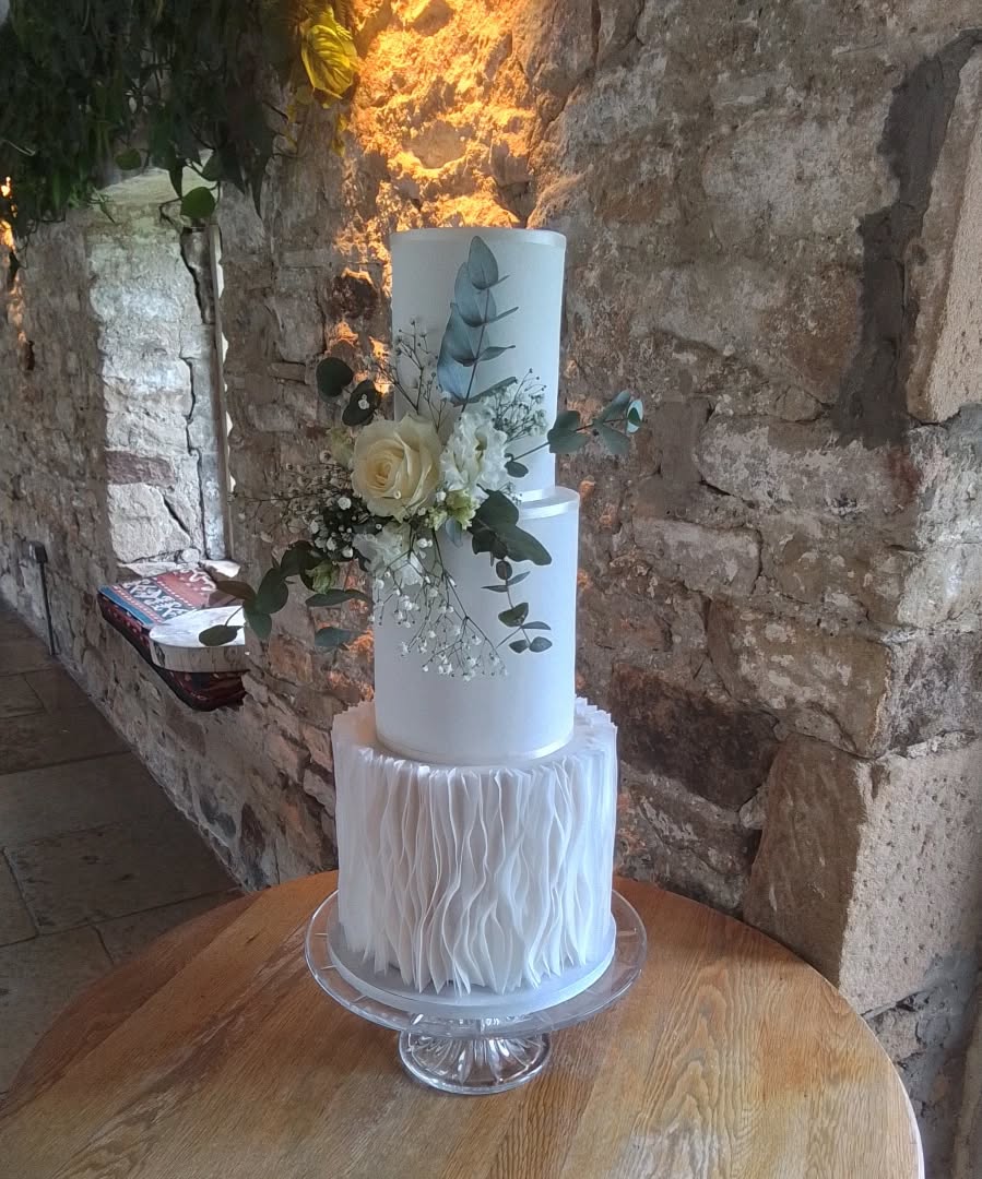 Dinak and Sarah Jane were married at the stunning Healey Barn last week.
The cakes they chose were Chocolate Mud Cake and rustic Carrott cake
Loved making this design with wafer paper frills.
#ivorycakecompany #healeybarnweddings #northumberlandweddingcakes
#northeastweddingcakes #newcastleweddingcakes
