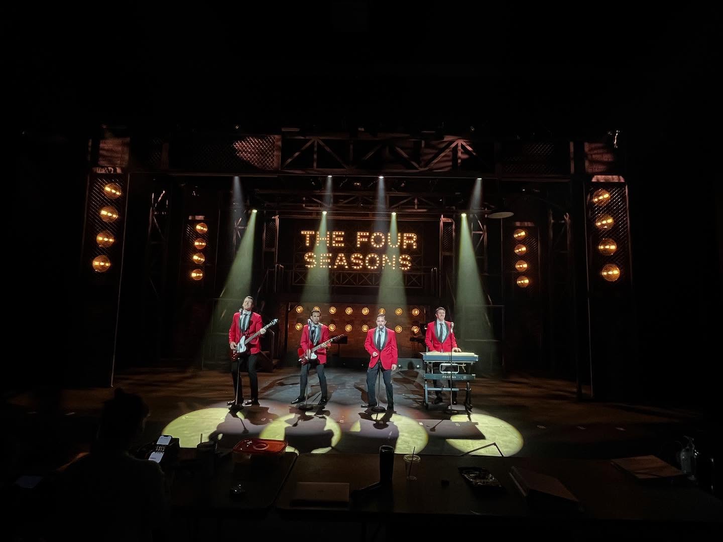 We are on day two of tech rehearsals.
“Hold, please. Let’s back up to the beginning of that scene.”
We are on day two of tech rehearsals. 10-hour days with a 2-hour dinner break from 2-4pm. Full costumes, hair, microphones. Going scene-by-scene, moment-by-moment. Lots of waiting. Lots of adjusting. Our amazing wardrobe, sound and light departments working harder than all of us combined making us look and sound perfect.
It’s a lesson in patience. For everyone.
You perform a scene. Well, really just a portion of the scene. Then stage management announces “hold, please.” And you stand there so they can focus and adjust the lights on you. Then you back up a few lines and continue on.
“Hold, please”
And they re-program and adjust the sound board to make sure that everyone on stage who is singing is heard. Then you back up a few lines and continue on.
“Hold, please”
And wardrobe runs onstage to fix, alter or deal with any costume issues that might have arisen. Then you back you back up a few lines and continue on.
On and on, for two 4-hour block. For two days in a row. Then a day off. Then again on Tuesday - but we add the full band. Then on Wednesday afternoon to prepare for our full invited-audience dress rehearsal later that evening.
So yeah, after being on my feet pretty much nonstop for eight hours per day, in dress shoes, carrying a solid body Gibson reverse Firebird guitar, my back is a wreck. My left shoulder is a wreck. I have never wanted or needed a full day off in quite some time. The excitement of opening night next Thursday seems more like a distant dream than a sure thing.
Even now, on our meal break, as I sit here in the house typing this, our lighting designer is working on his cues, our female, swing, Abigail, is walking the stage script in hand going over the three tracks she covers and one of our amazing ASM’s (assistant stage managers), Peyton, is reading a book while still wearing her backstage headset.
Everyone is working towards a common goal. And the city of Franklin, TN isn’t going to know what hit them come next Thursday.